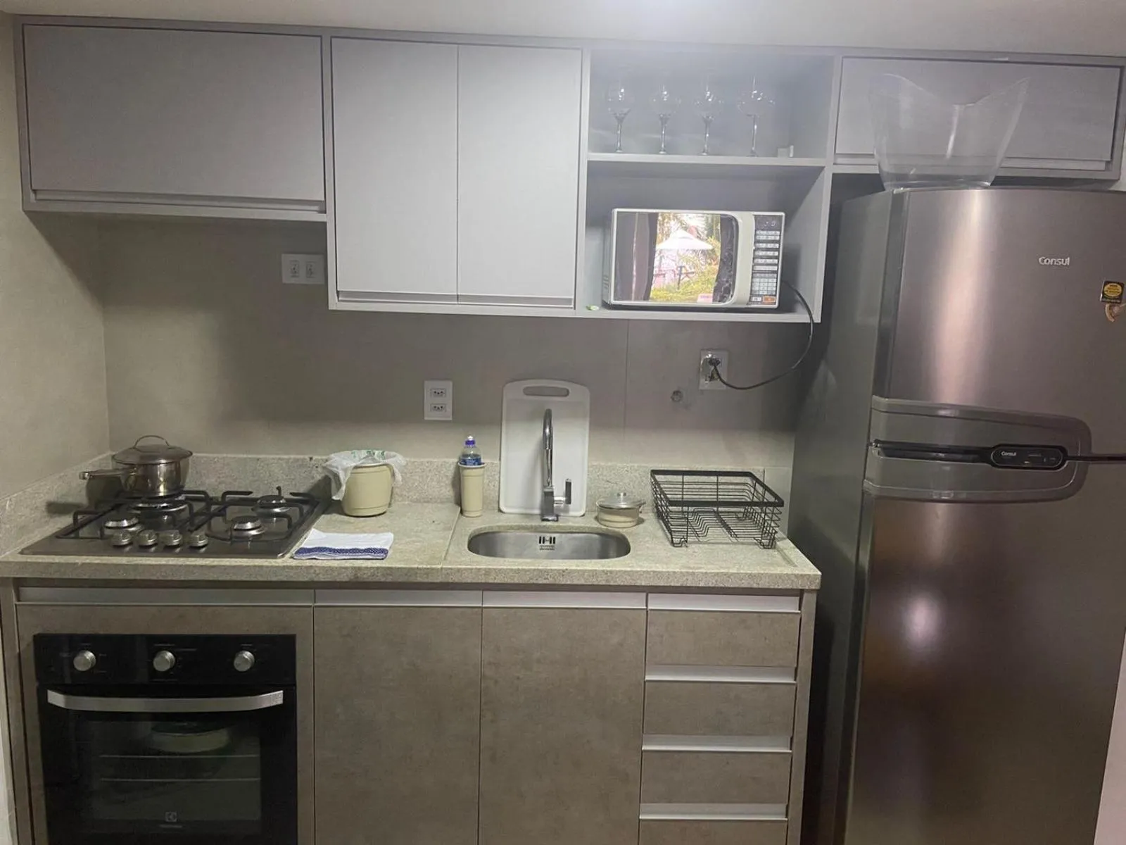 Communal kitchen in Apartamento Enseada Praia do Forte