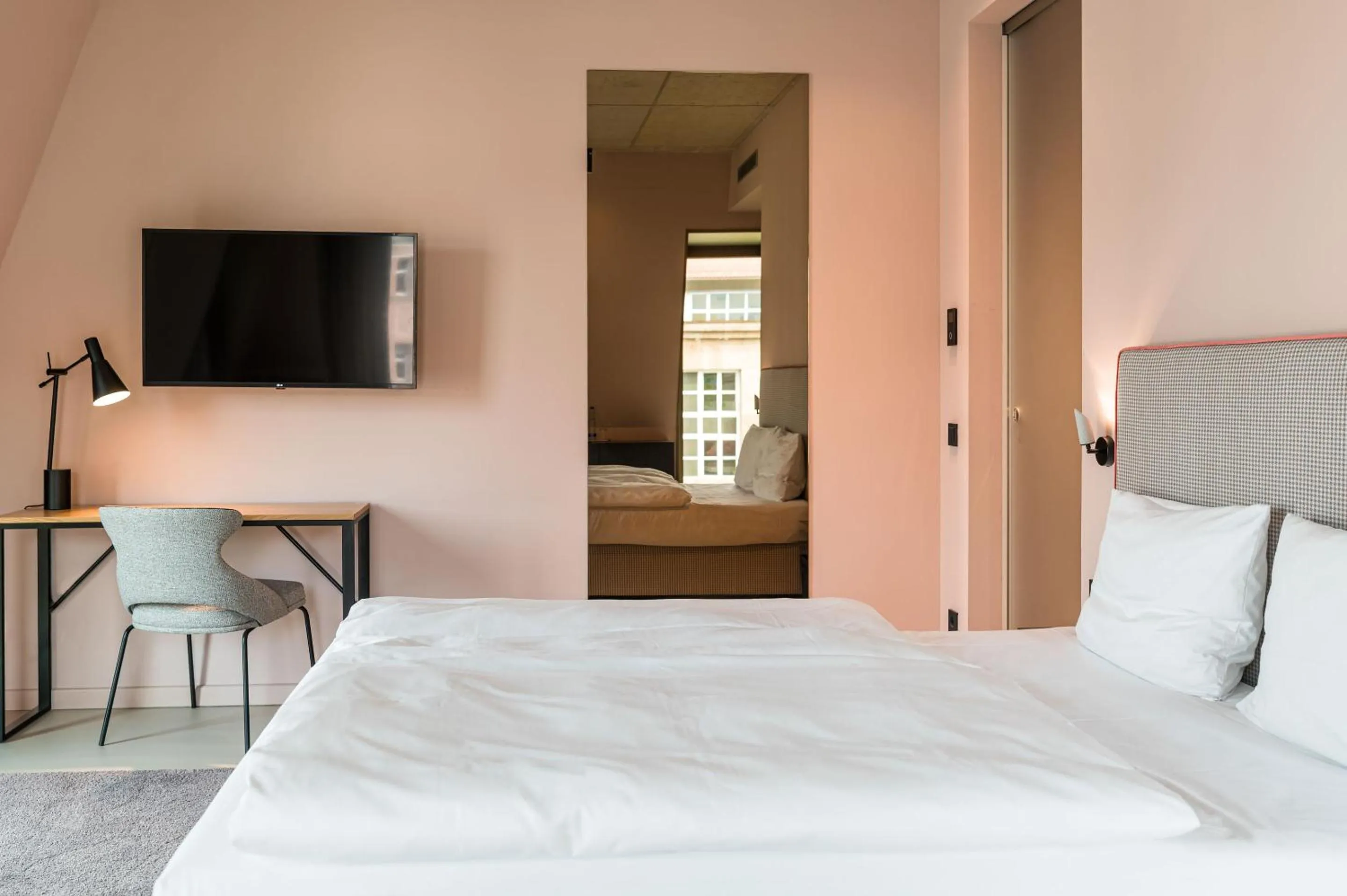 Bed in Hotel Miano by Limehome