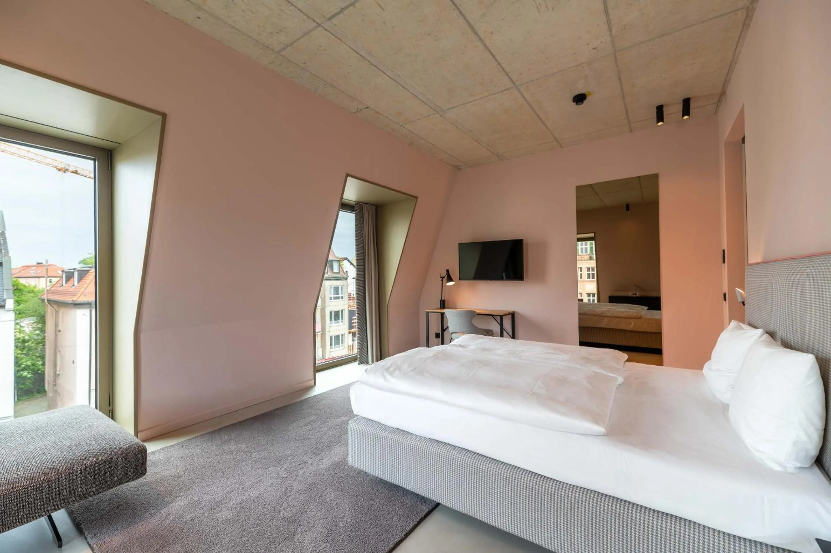 Bed in Hotel Miano by Limehome