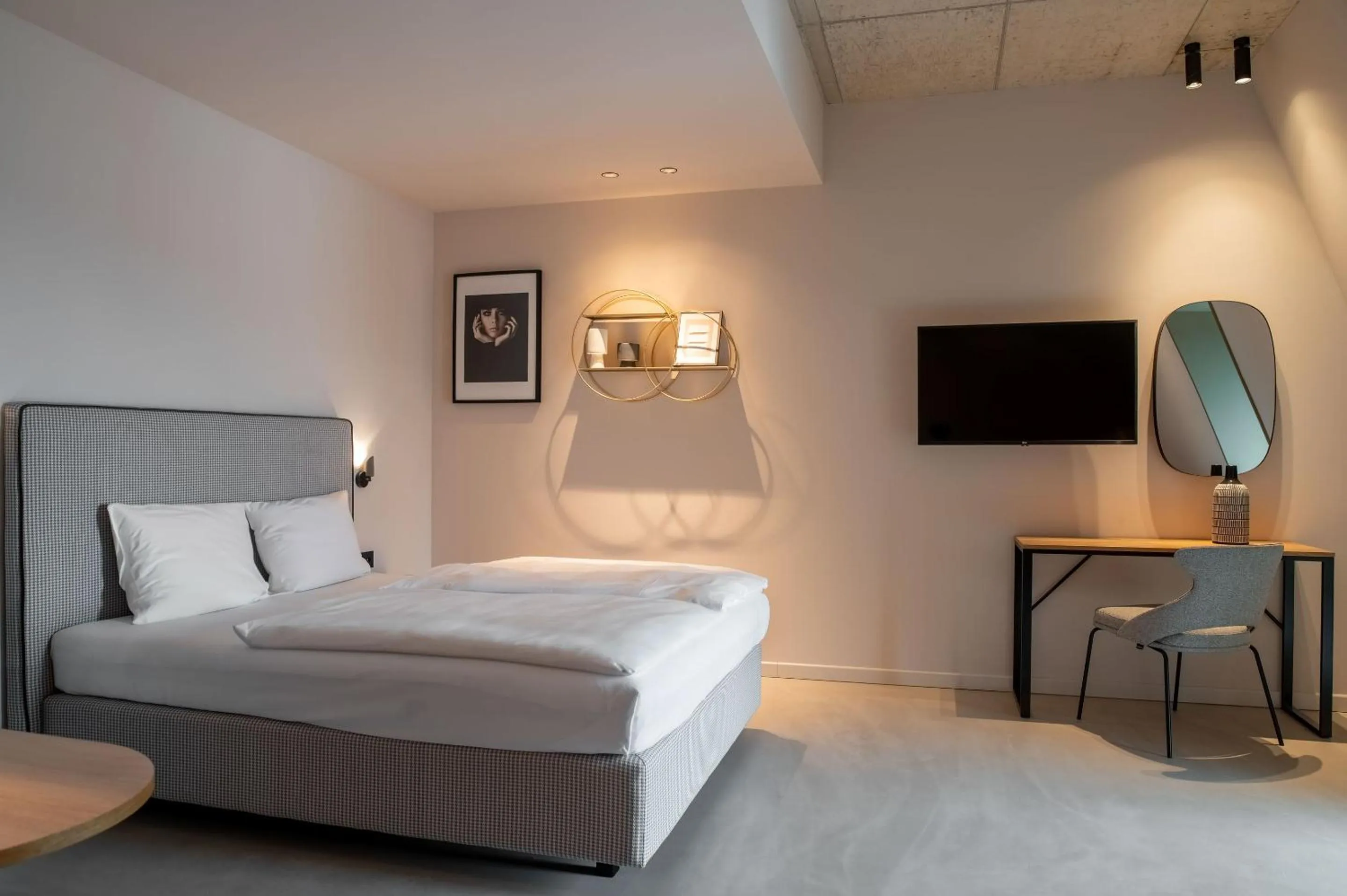 Bed in Hotel Miano by Limehome