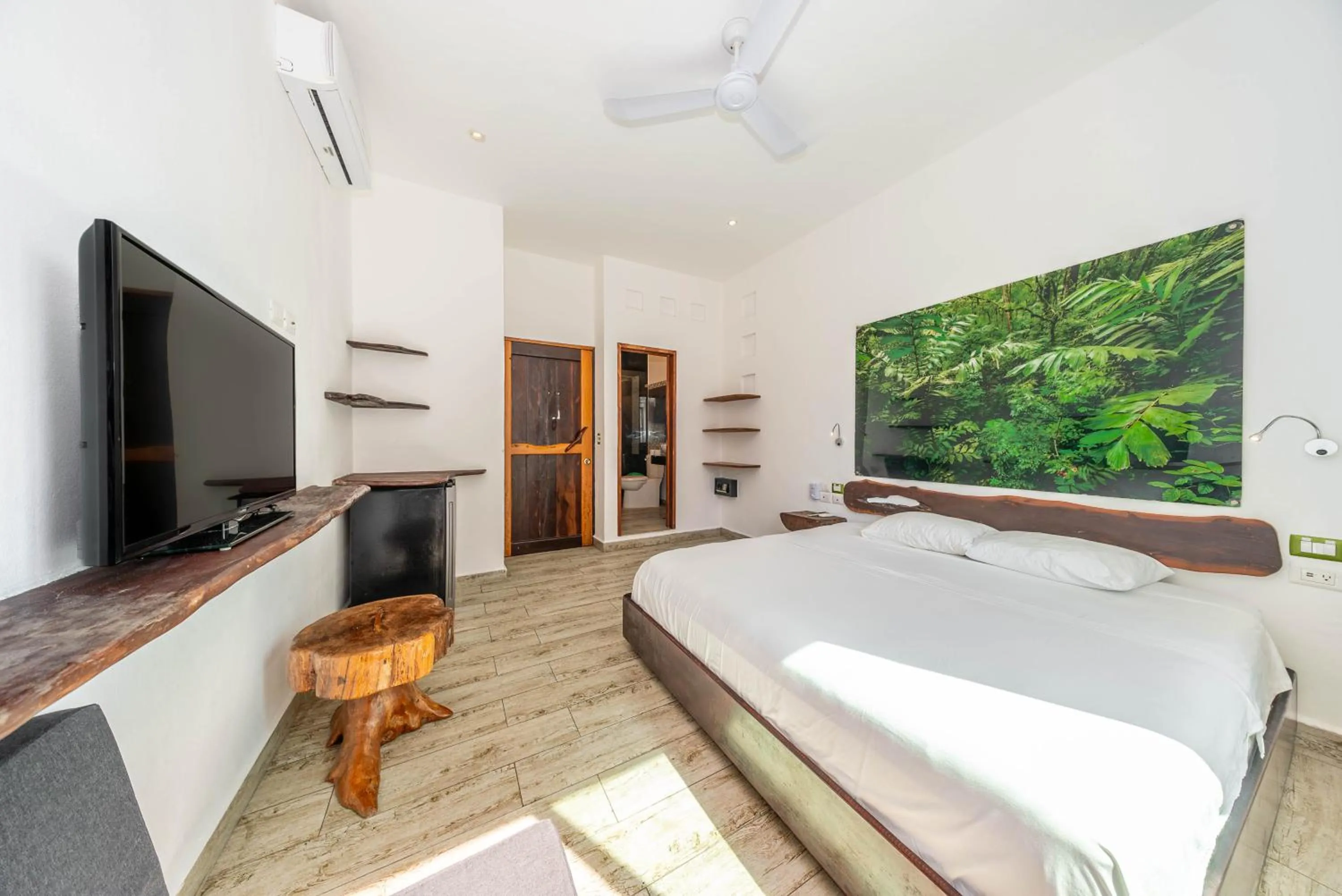 Bed in The Green Village Boutique Hotel