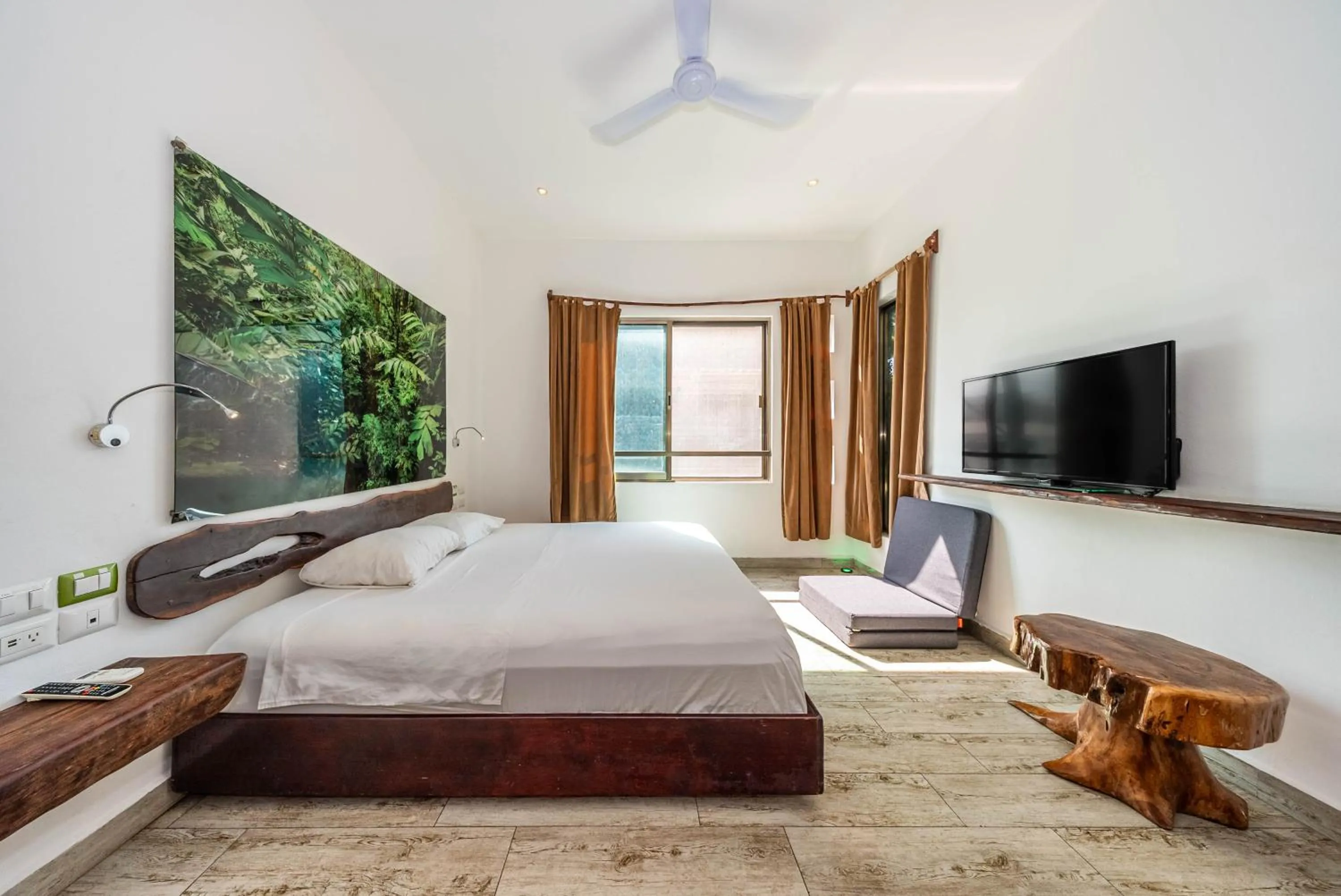 Bed in The Green Village Boutique Hotel