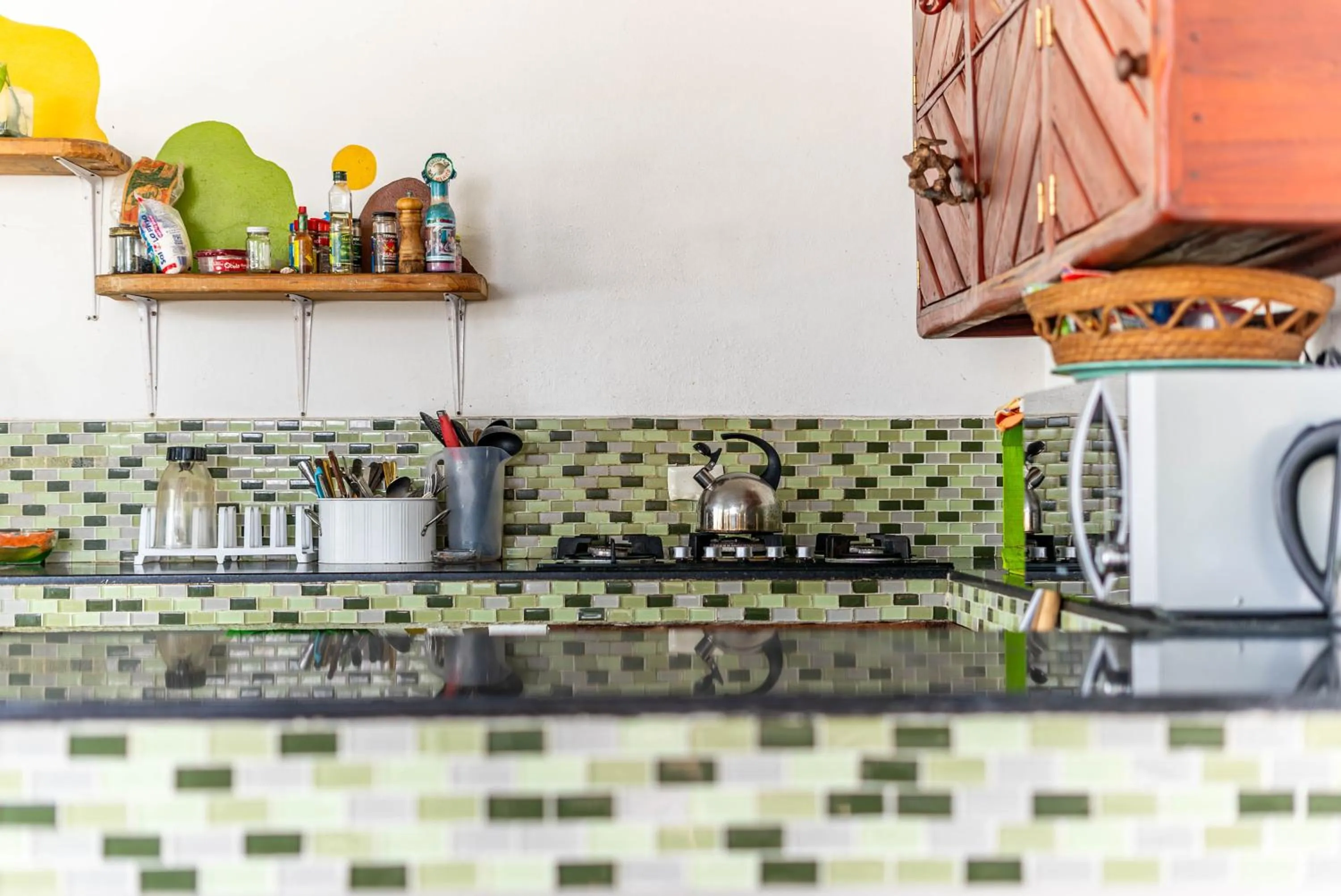 Kitchen or kitchenette in The Green Village Boutique Hotel