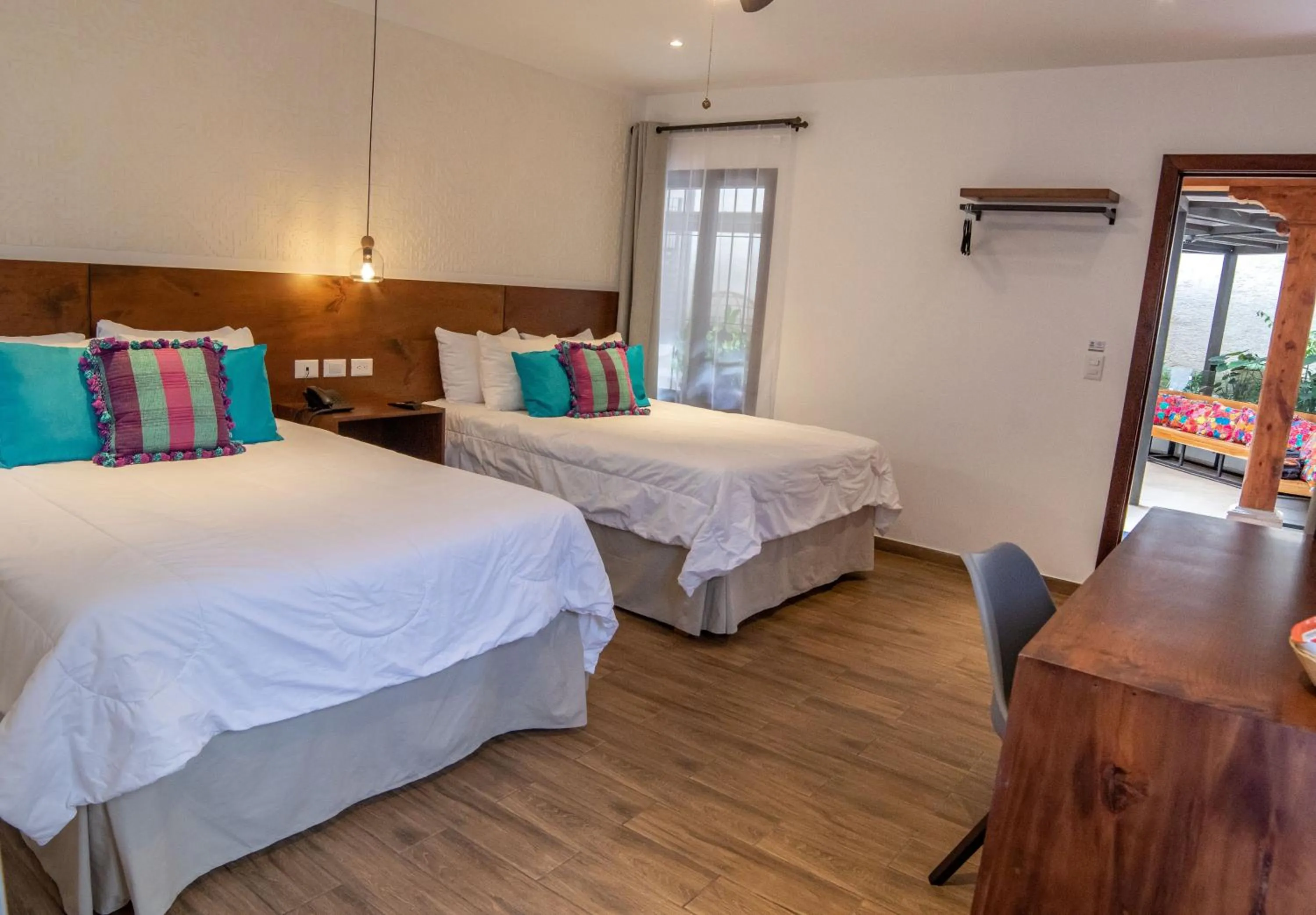 Bed in Hotel Las Camelias Inn by AHS