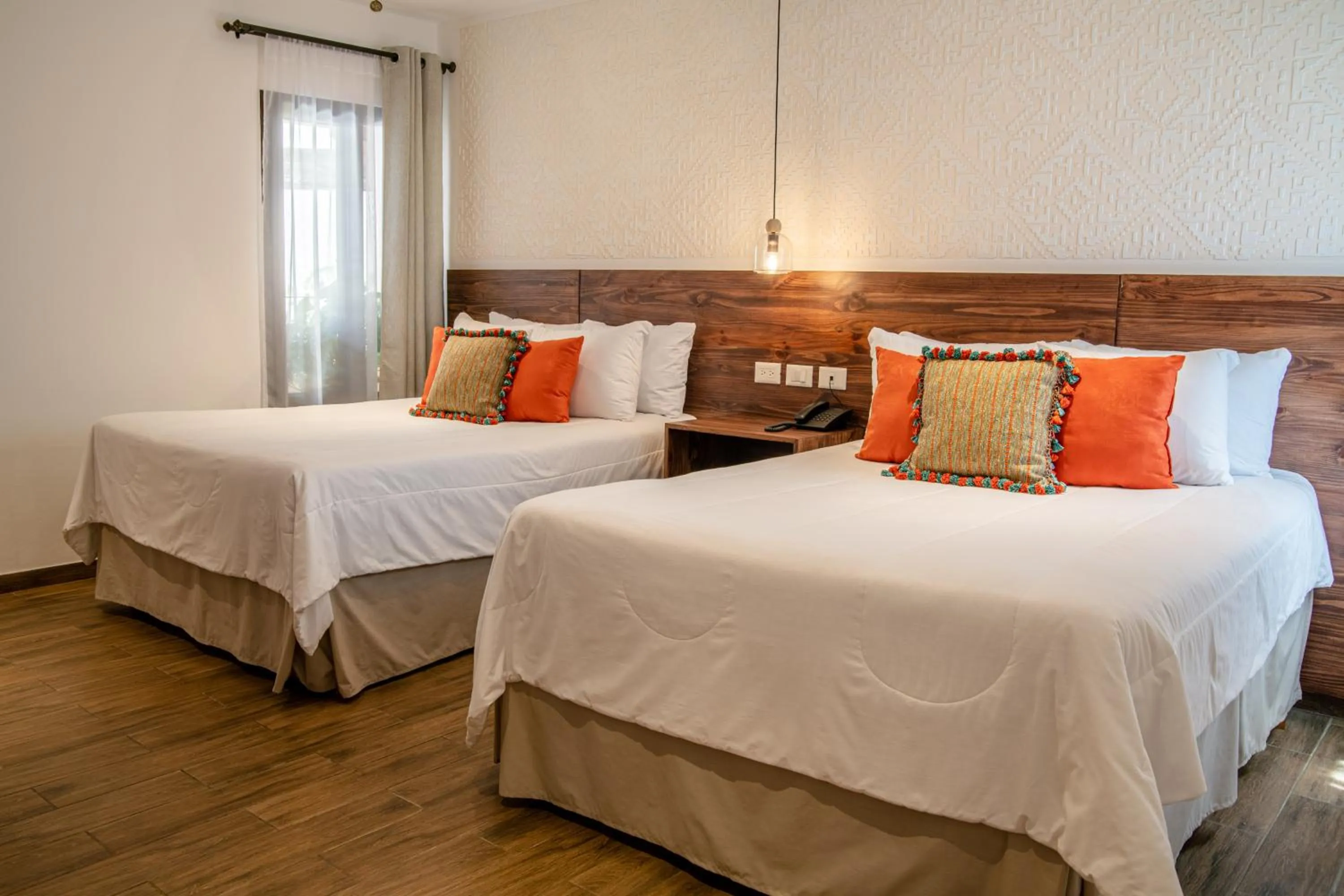 Bed in Hotel Las Camelias Inn by AHS