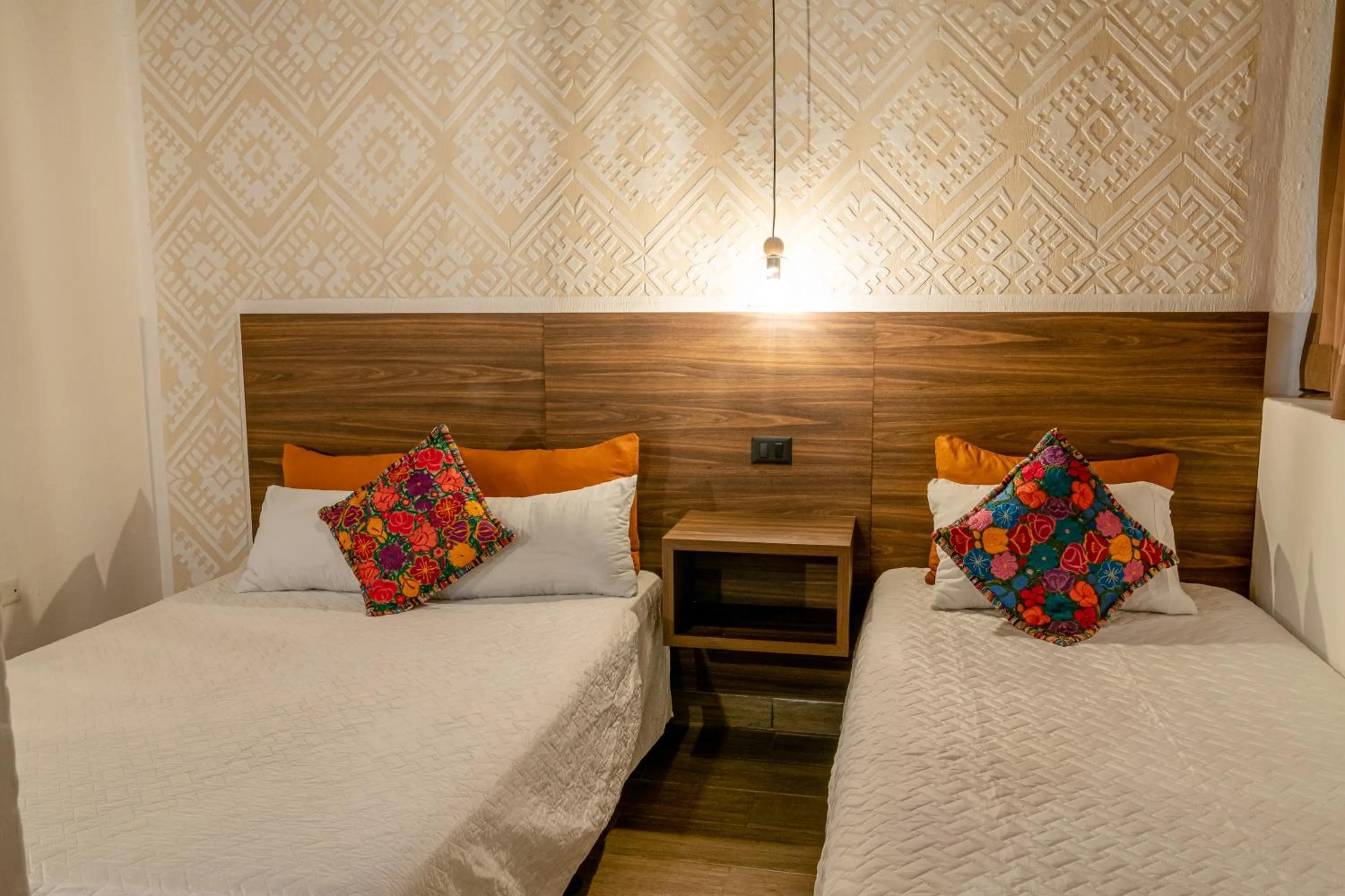 Bed in Hotel Las Camelias Inn by AHS