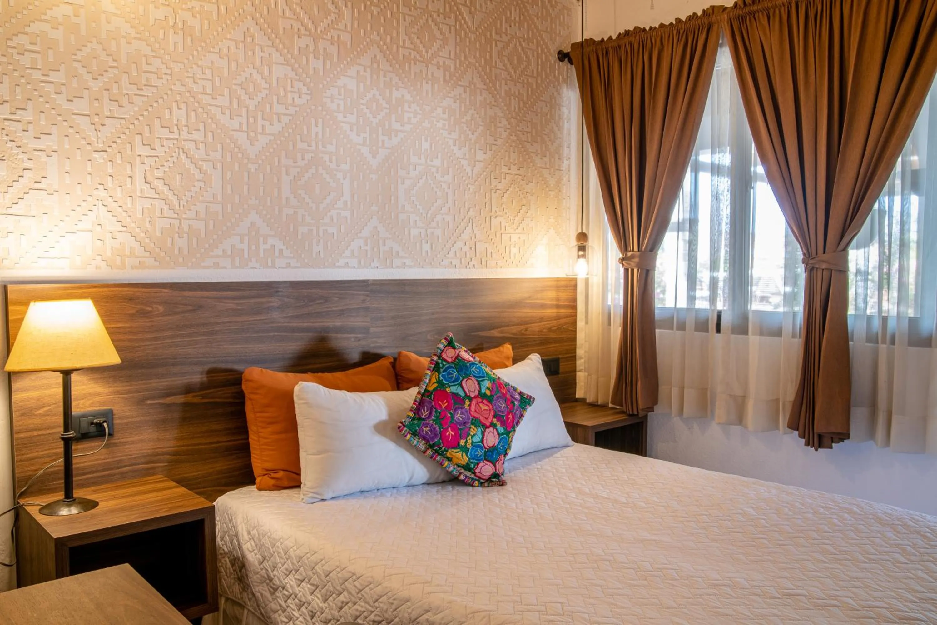 Bed in Hotel Las Camelias Inn by AHS