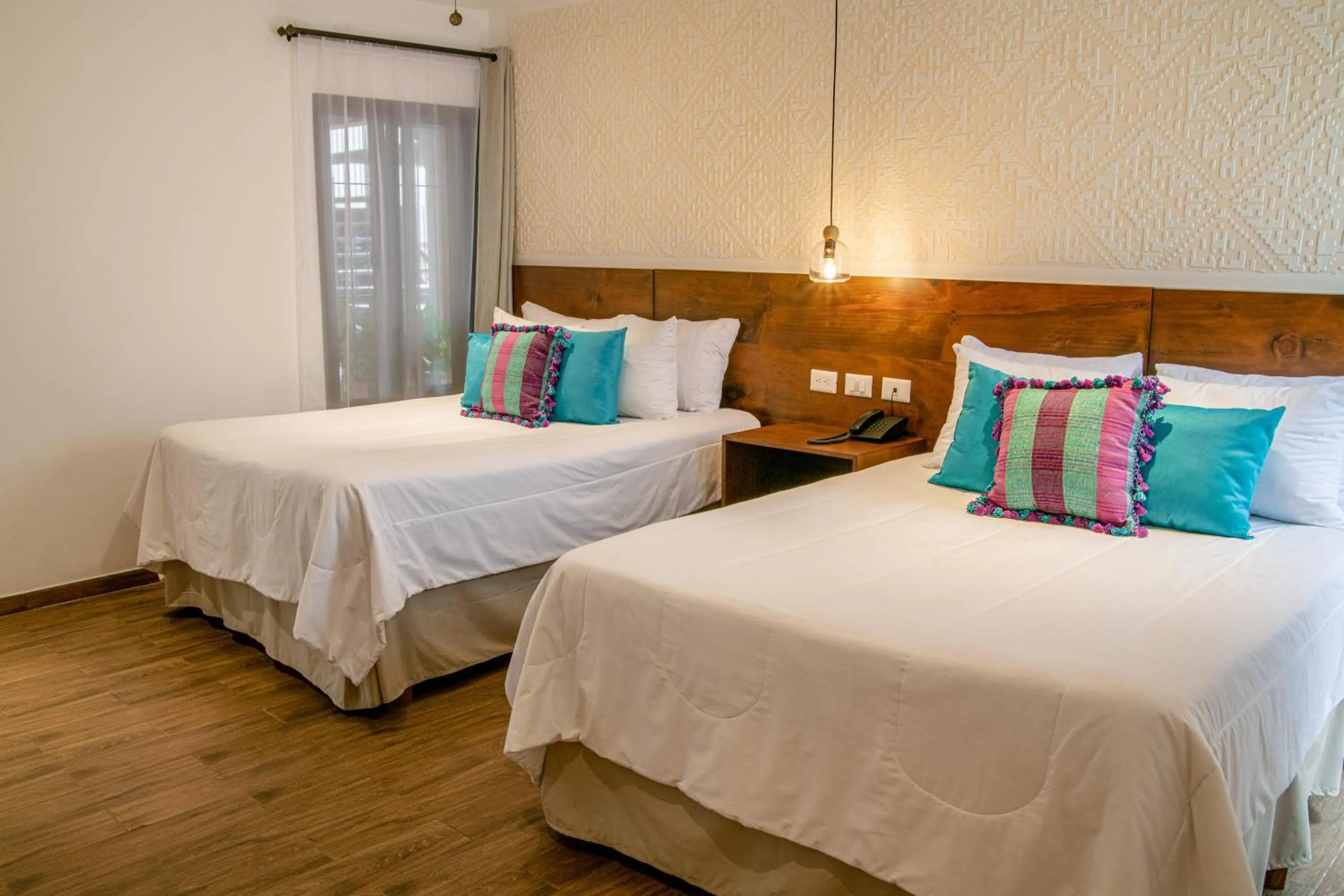 Bed in Hotel Las Camelias Inn by AHS