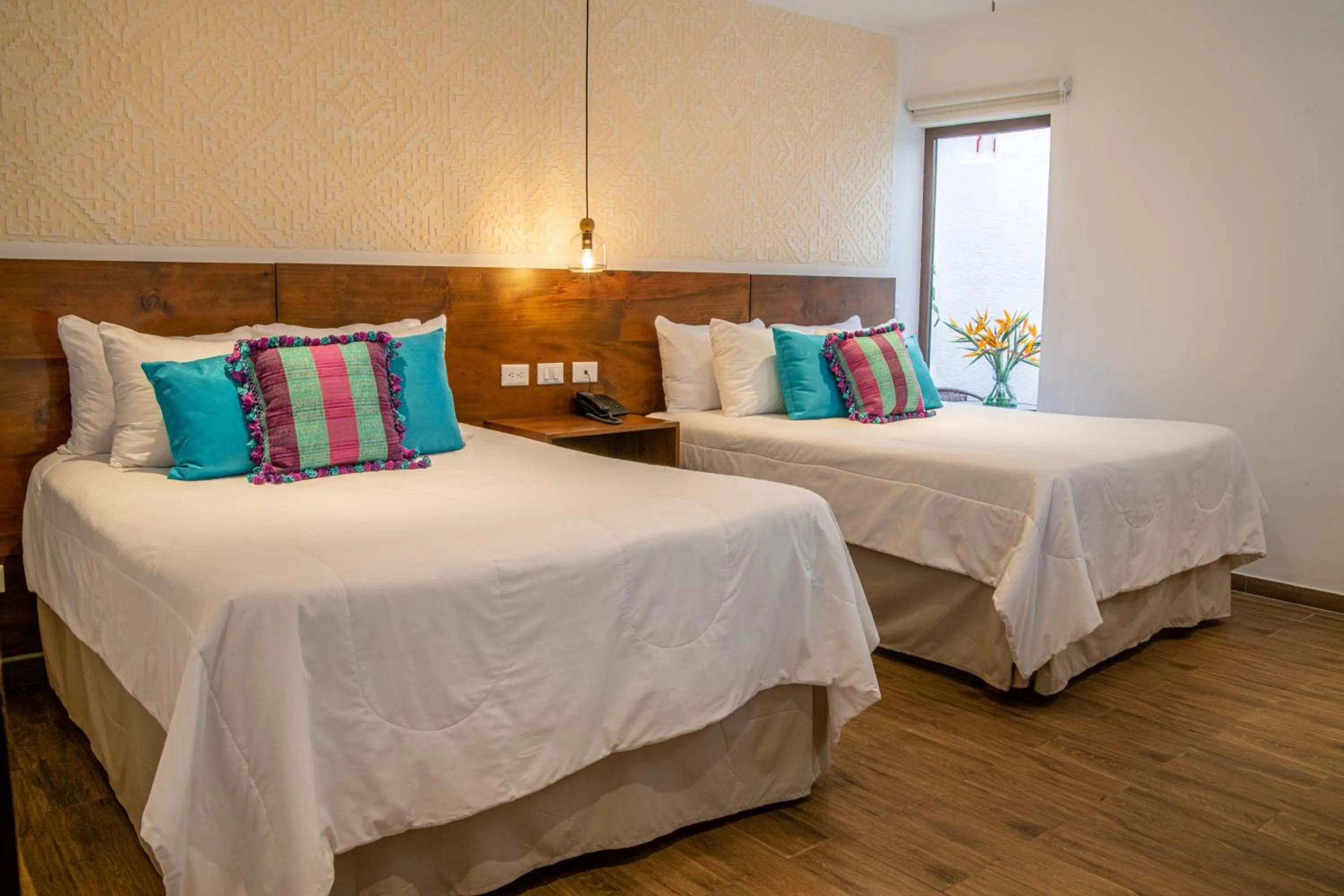 Bed in Hotel Las Camelias Inn by AHS