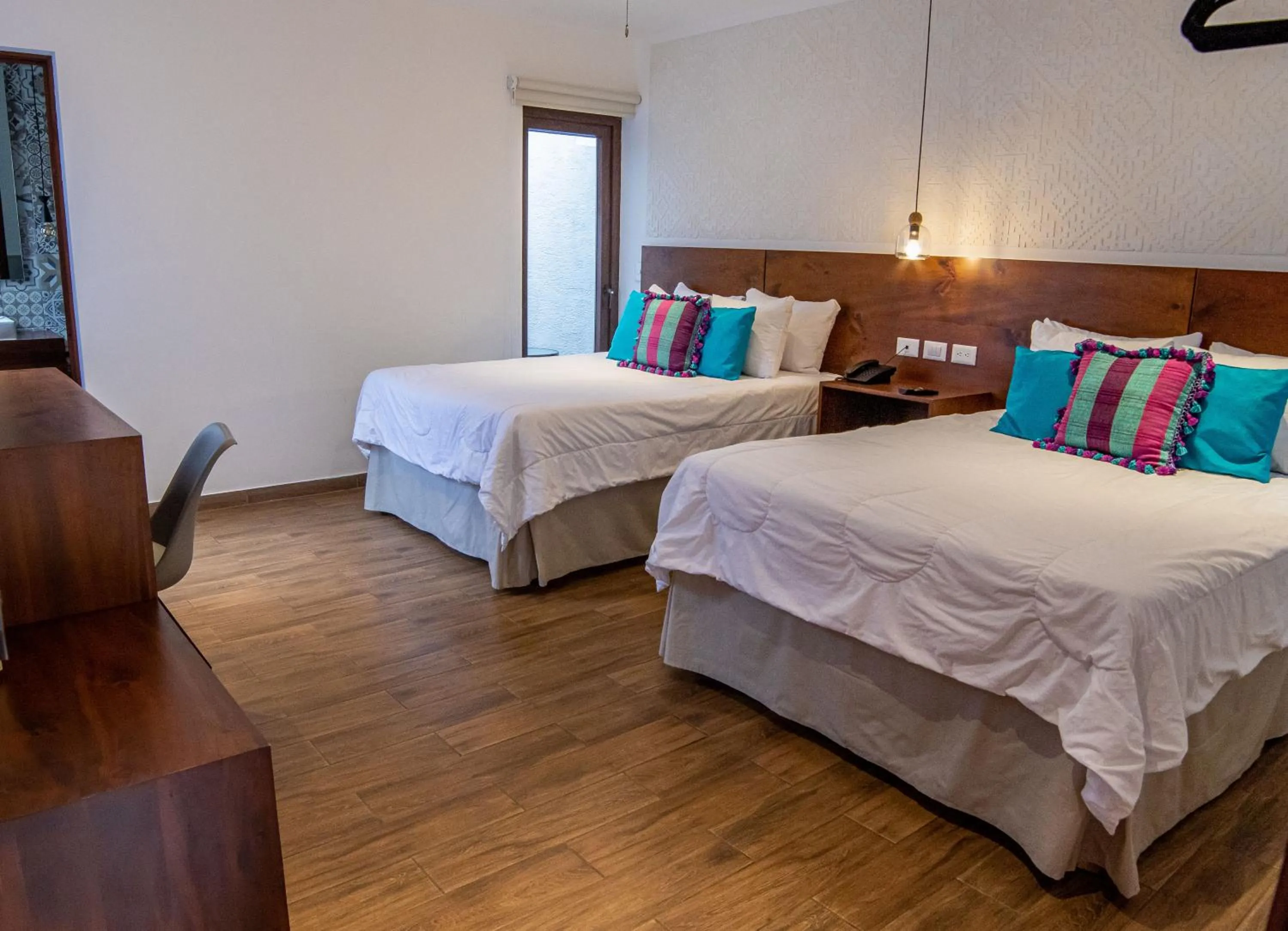 Bed in Hotel Las Camelias Inn by AHS