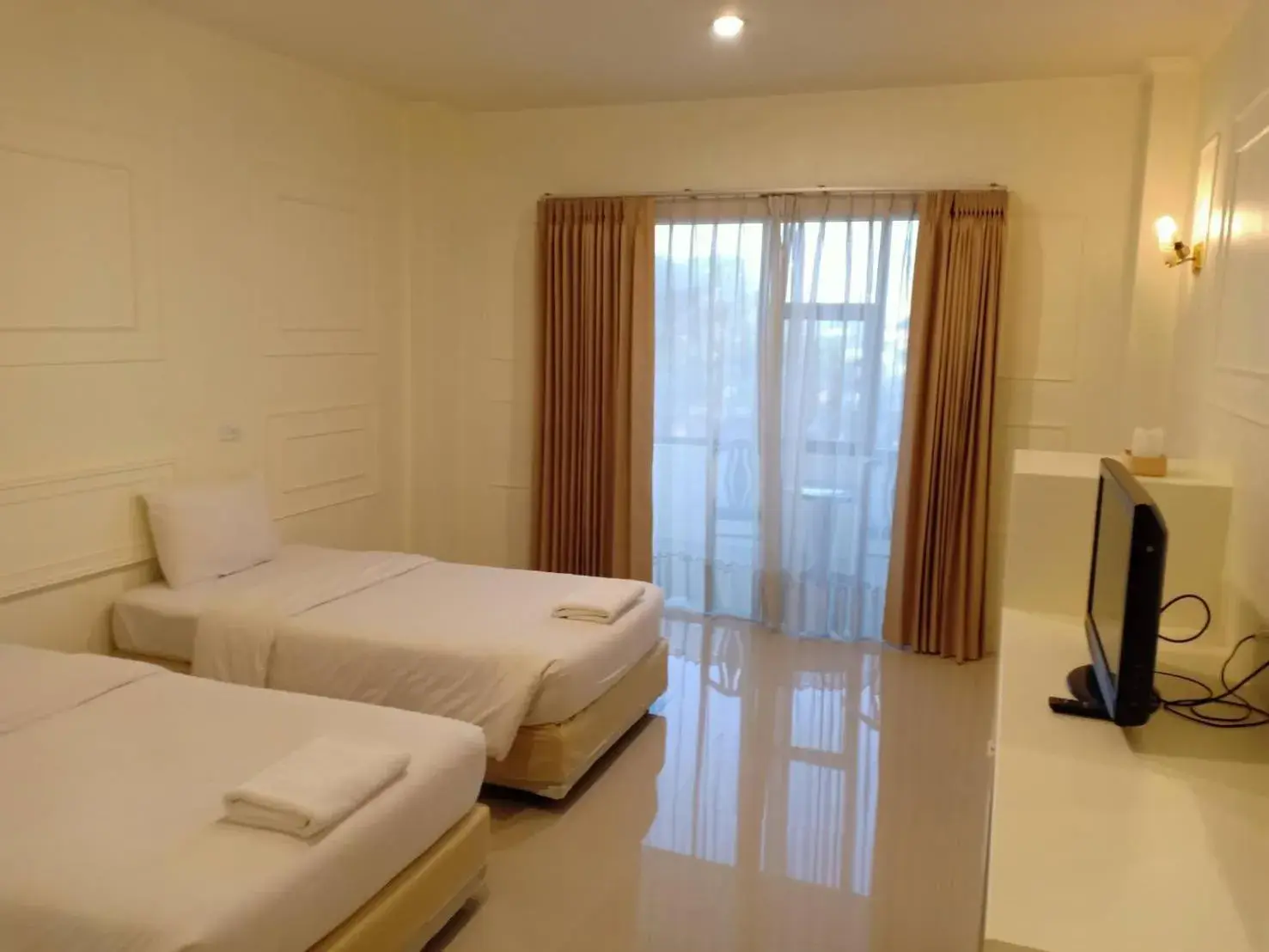 Bed in Golden Dragon Resort Bed in Golden Dragon Resort