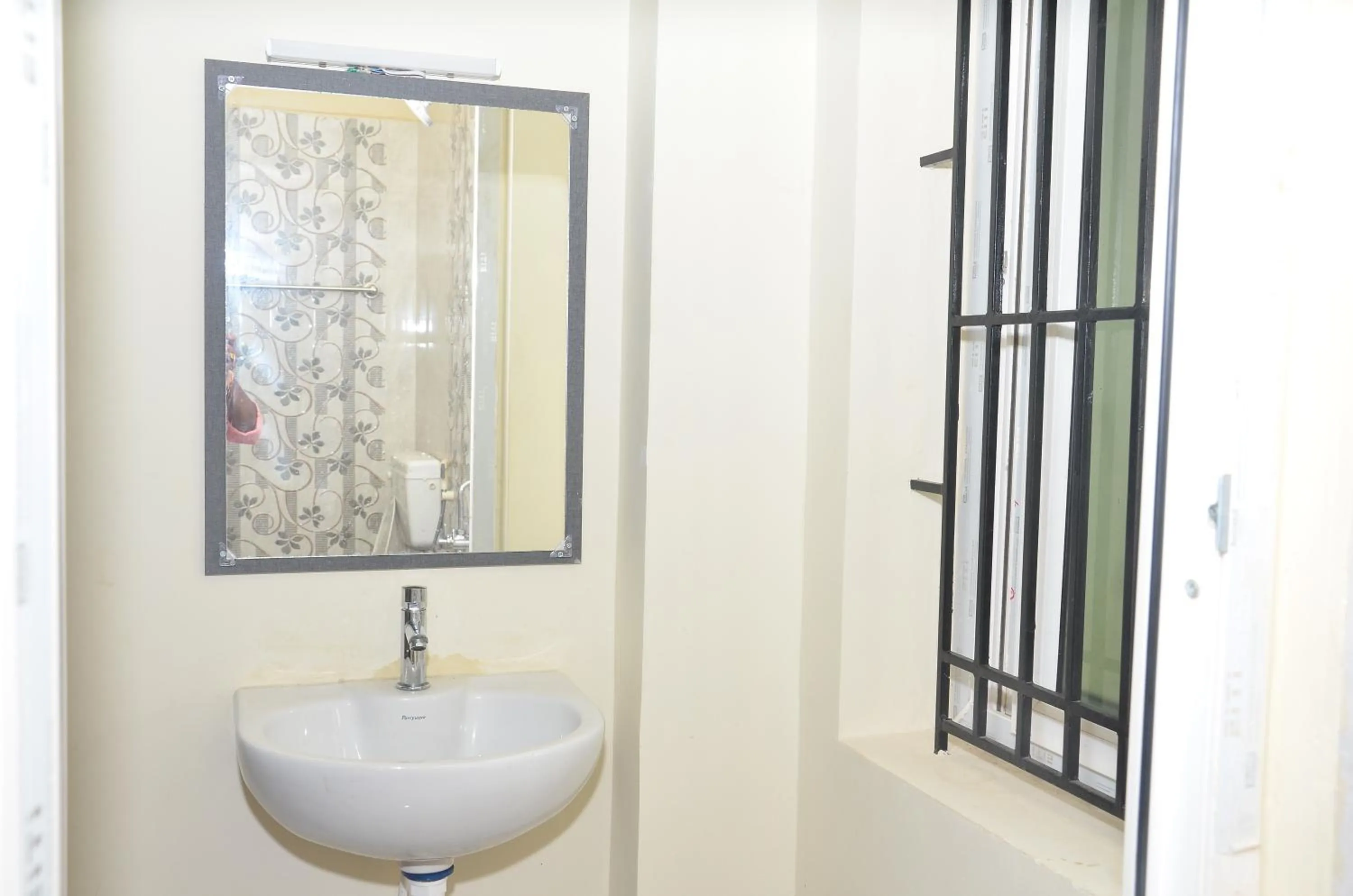 Bathroom in HOTEL PANCHAVARNAA