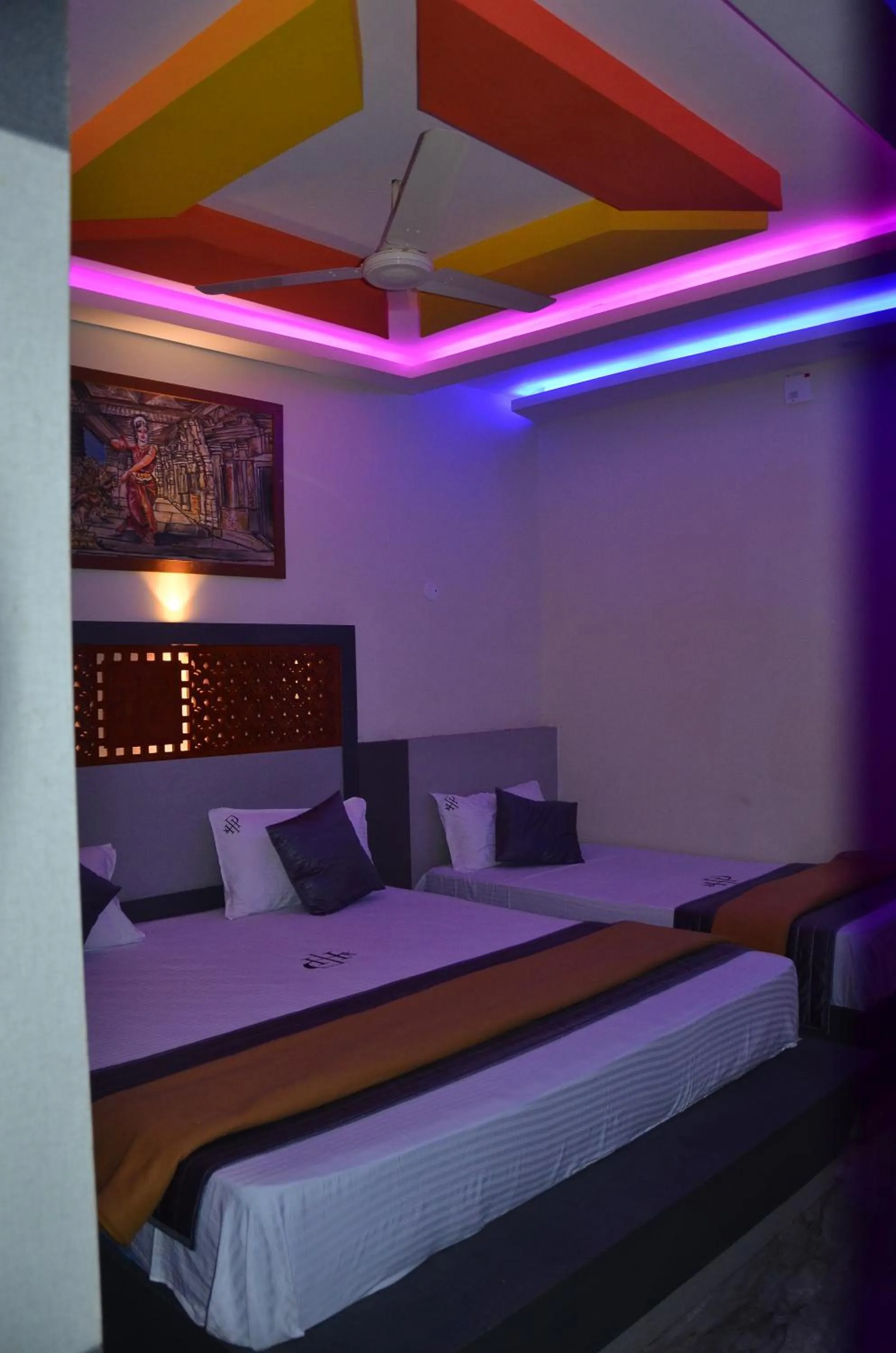 Bed in HOTEL PANCHAVARNAA