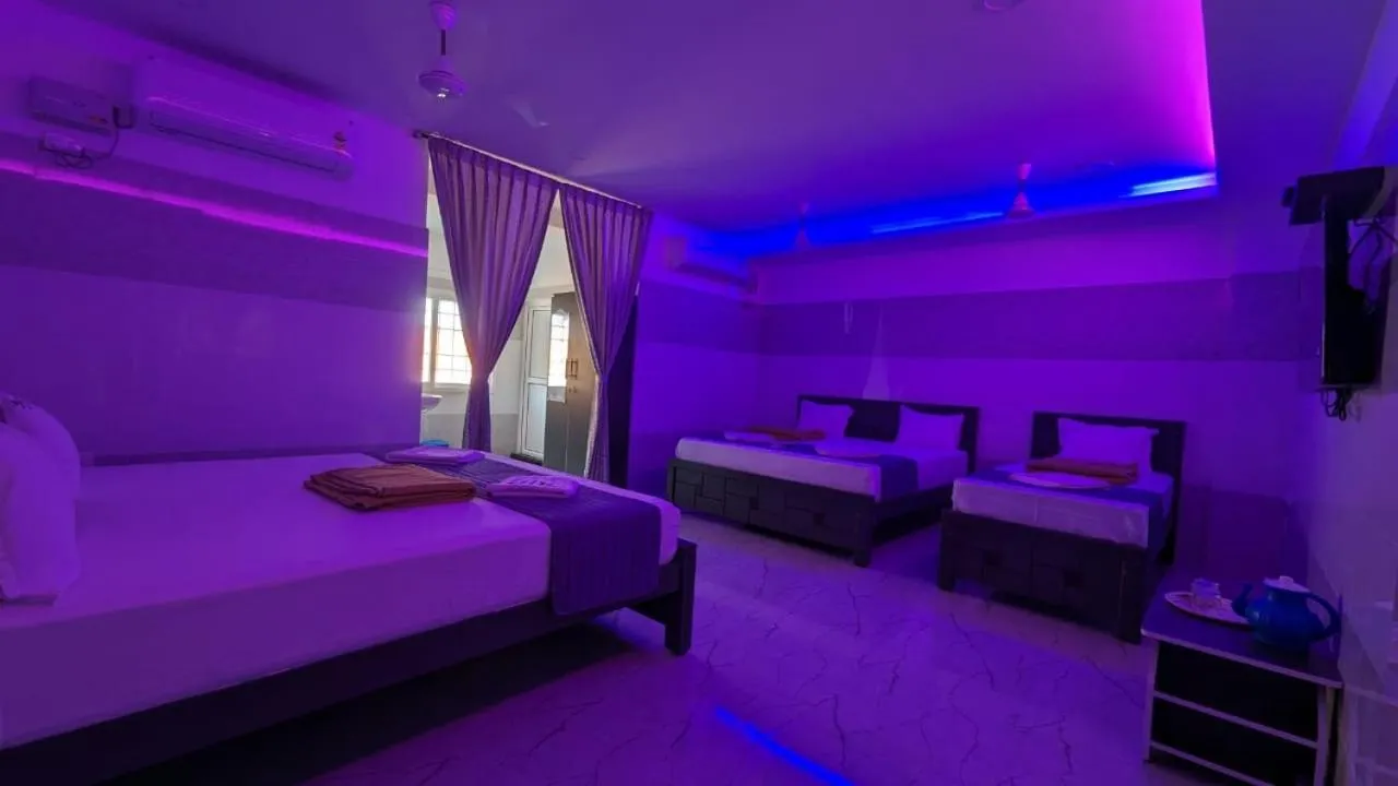 Bed in HOTEL PANCHAVARNAA