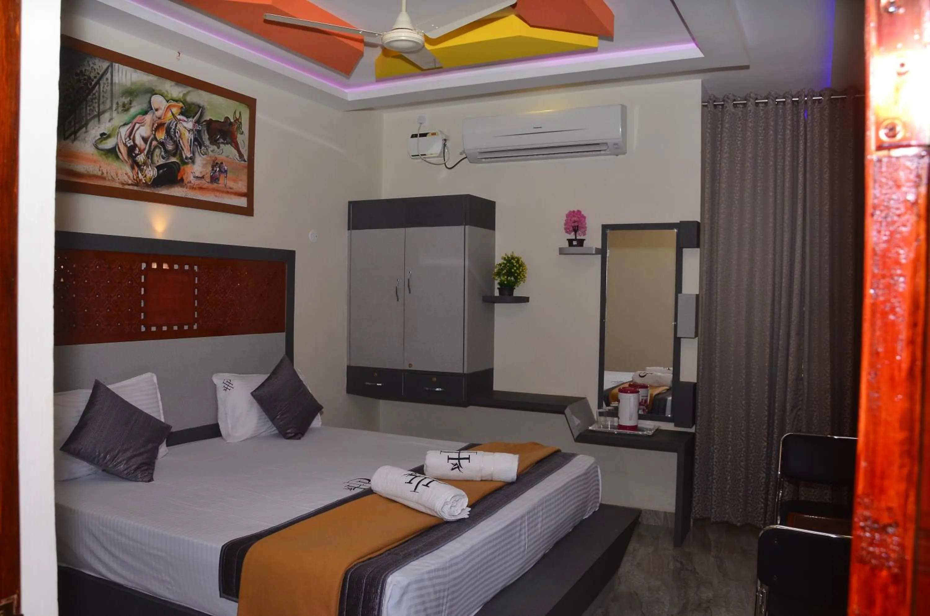 Bed in HOTEL PANCHAVARNAA
