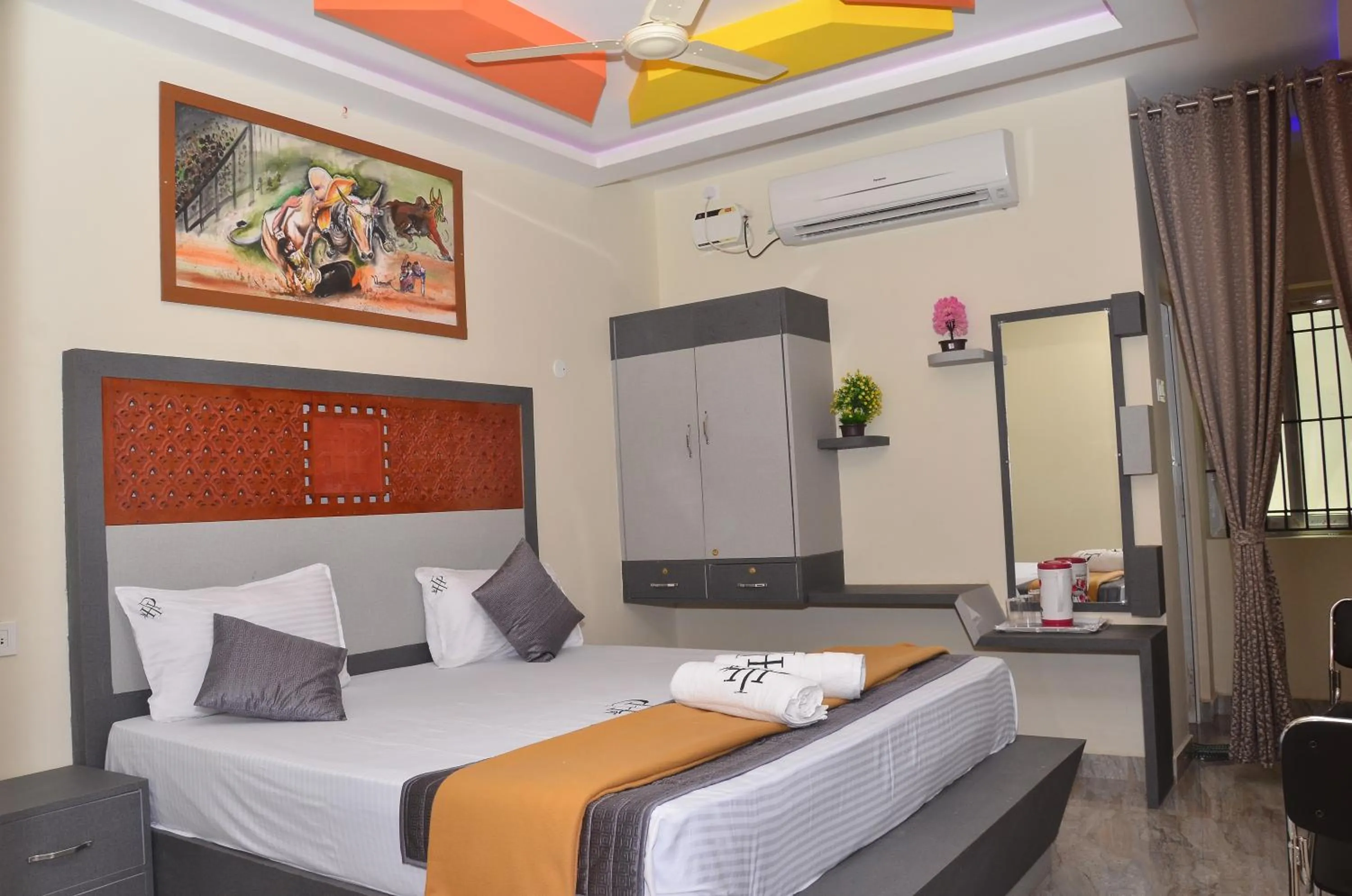 Bed in HOTEL PANCHAVARNAA