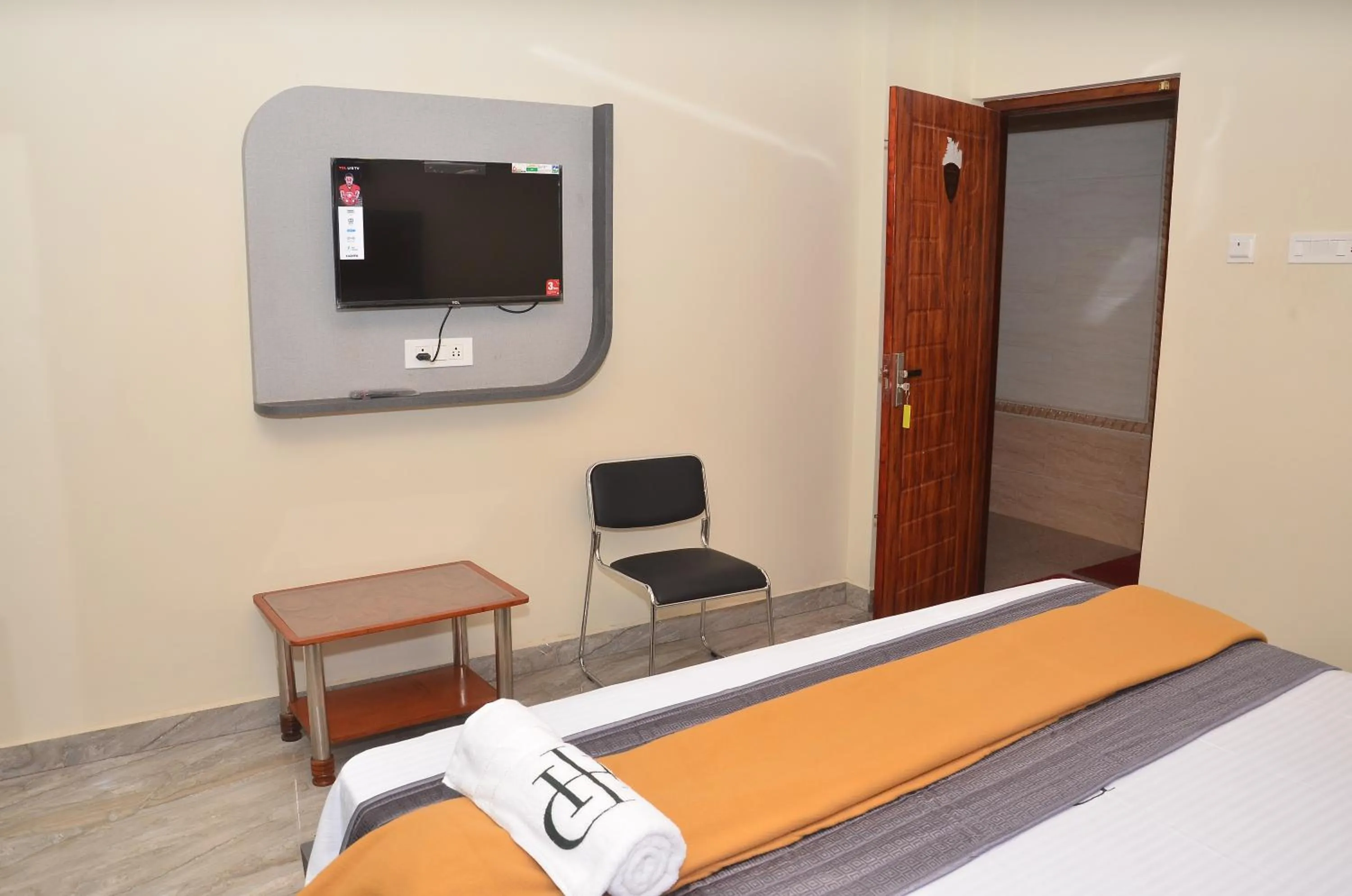 Bed in HOTEL PANCHAVARNAA