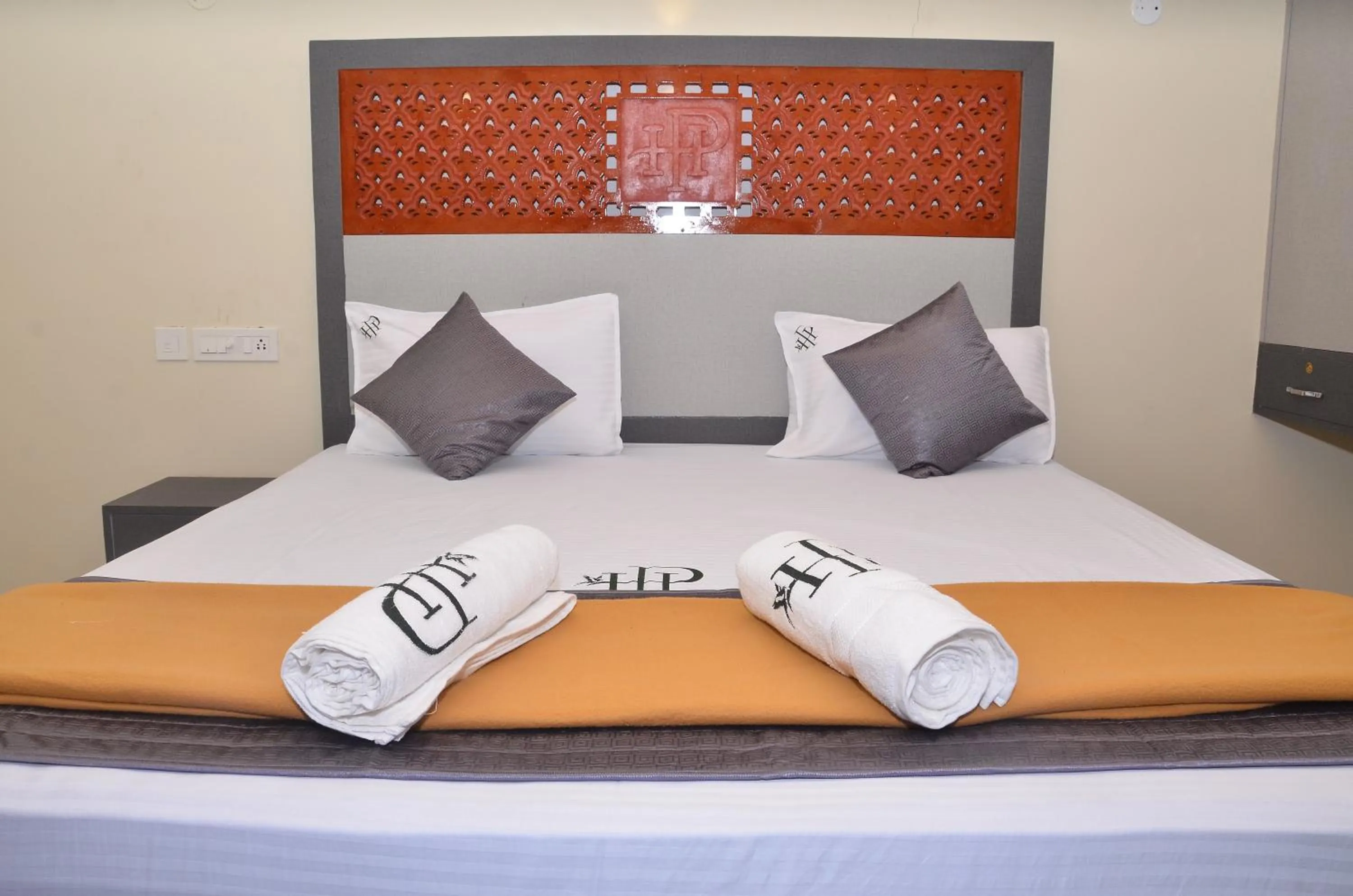Bed in HOTEL PANCHAVARNAA