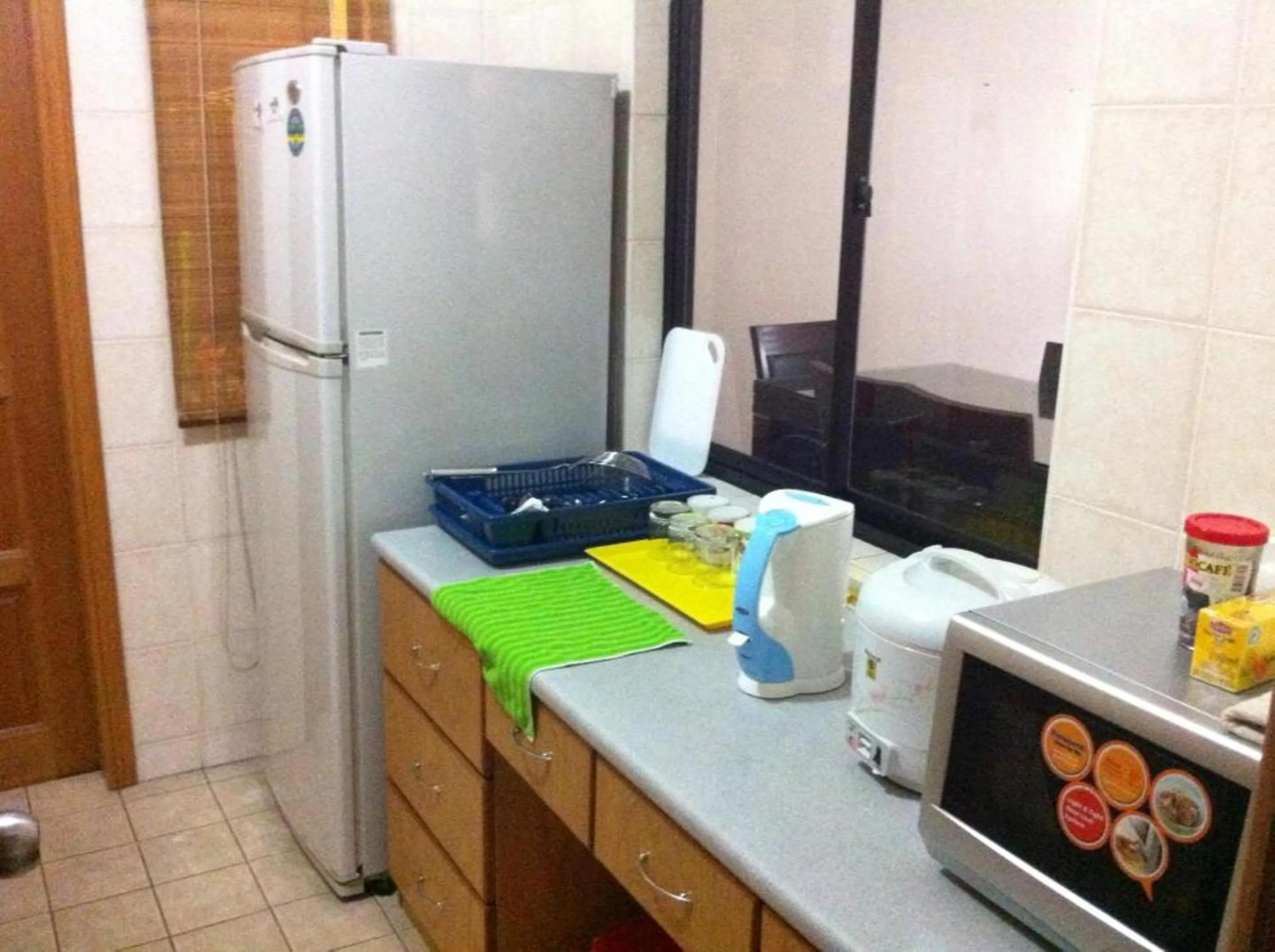 Kitchen or kitchenette in Marina Condominium Holiday Homestay