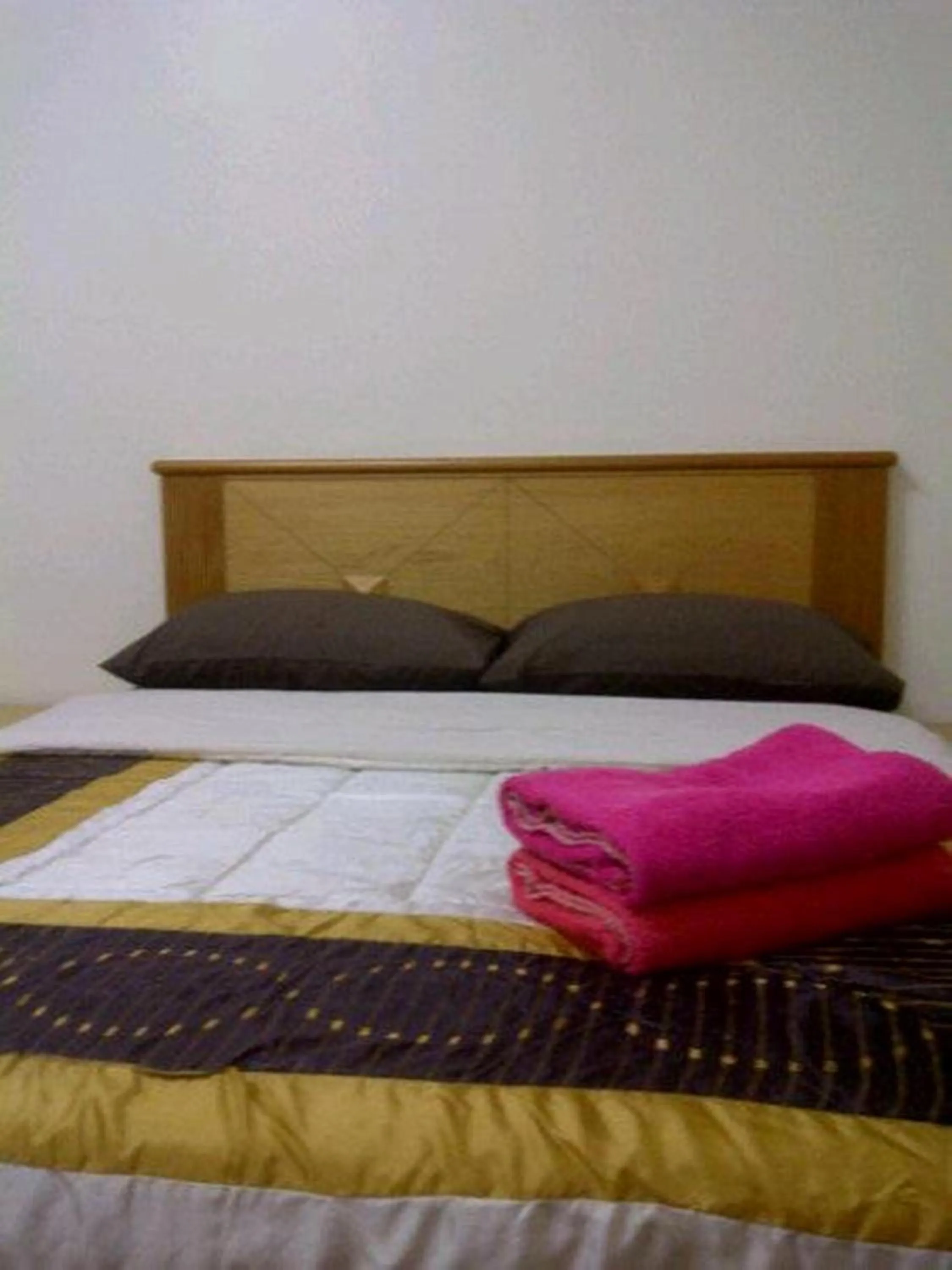 Bedroom, Bed in Marina Condominium Holiday Homestay