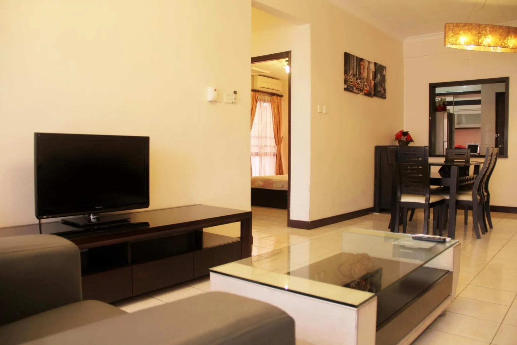 TV and multimedia in Marina Condominium Holiday Homestay