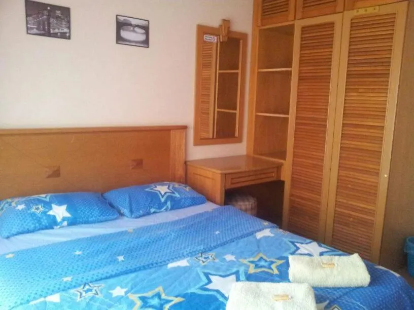Bedroom, Bed in Marina Condominium Holiday Homestay