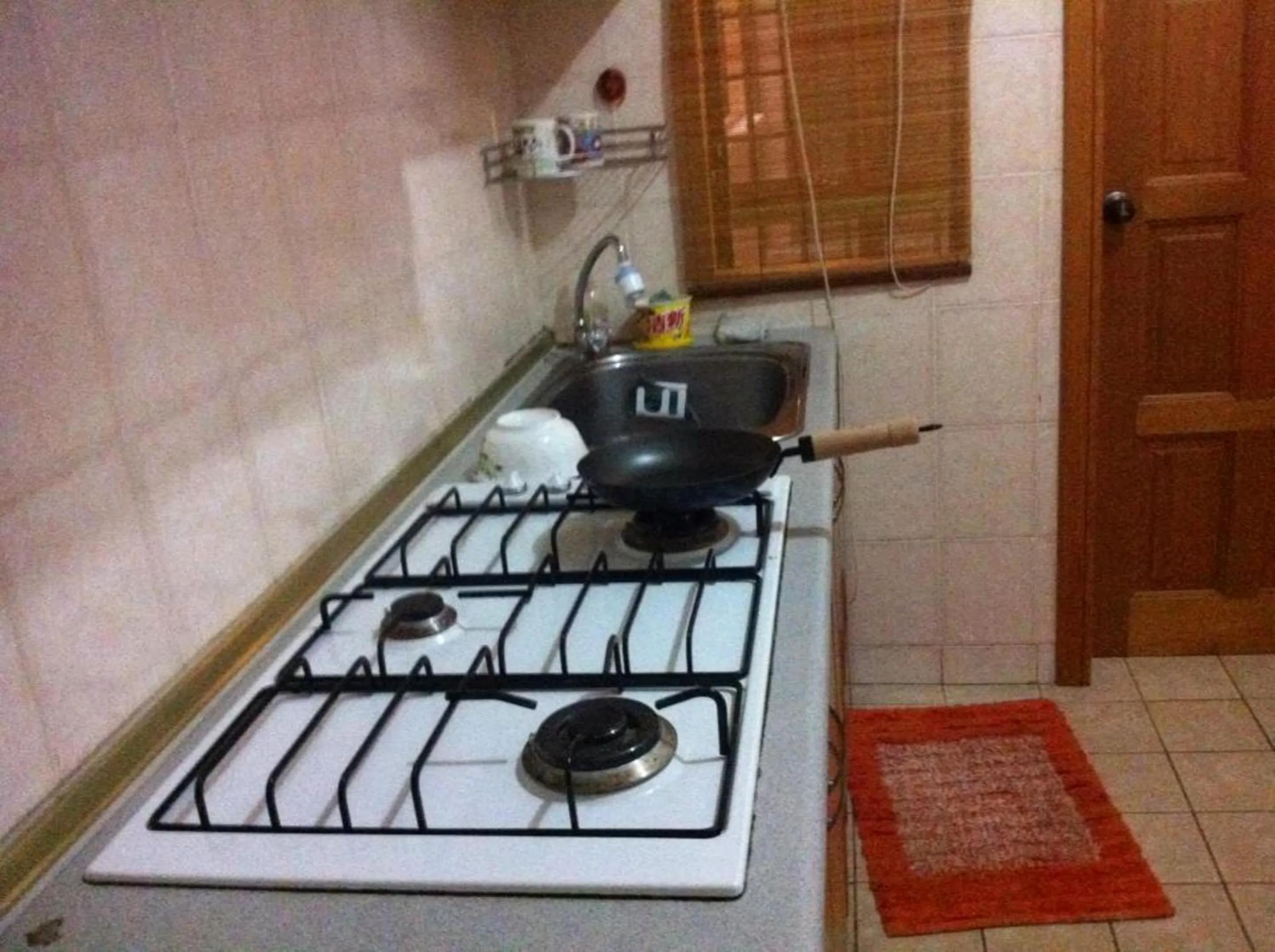 Kitchen or kitchenette in Marina Condominium Holiday Homestay