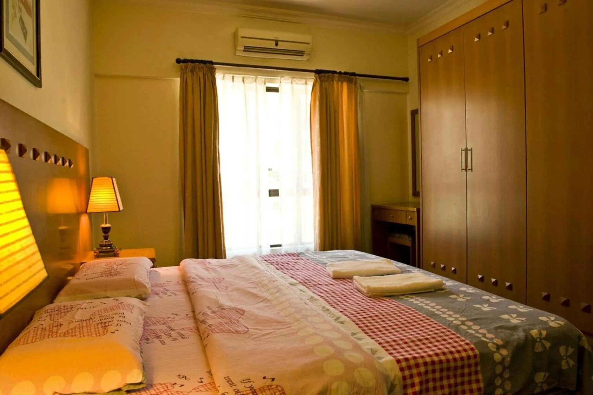 Bed in Marina Condominium Holiday Homestay