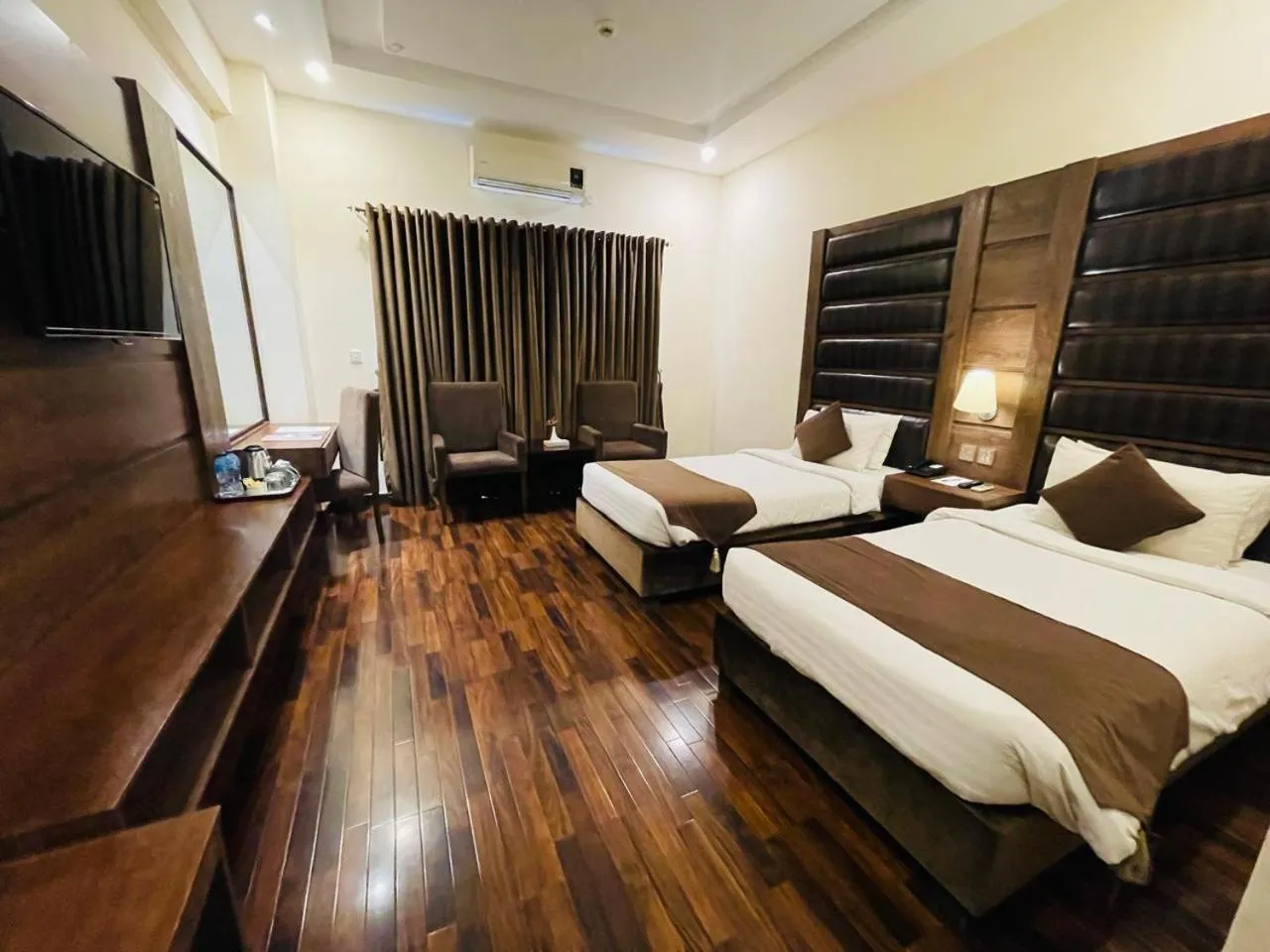 Bed in Legend Hotel Islamabad