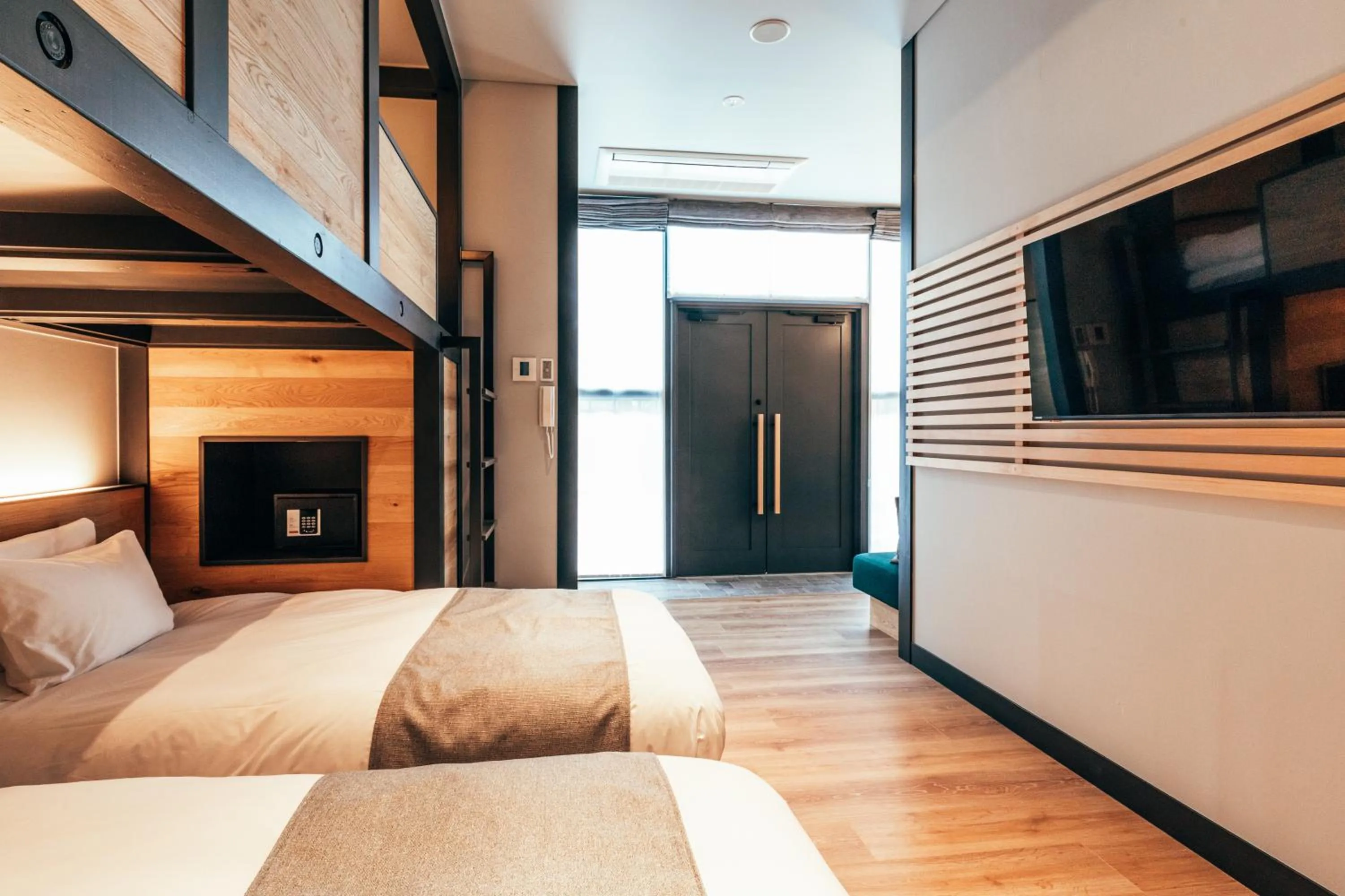 Bed in HOTEL KARUIZAWA CROSS