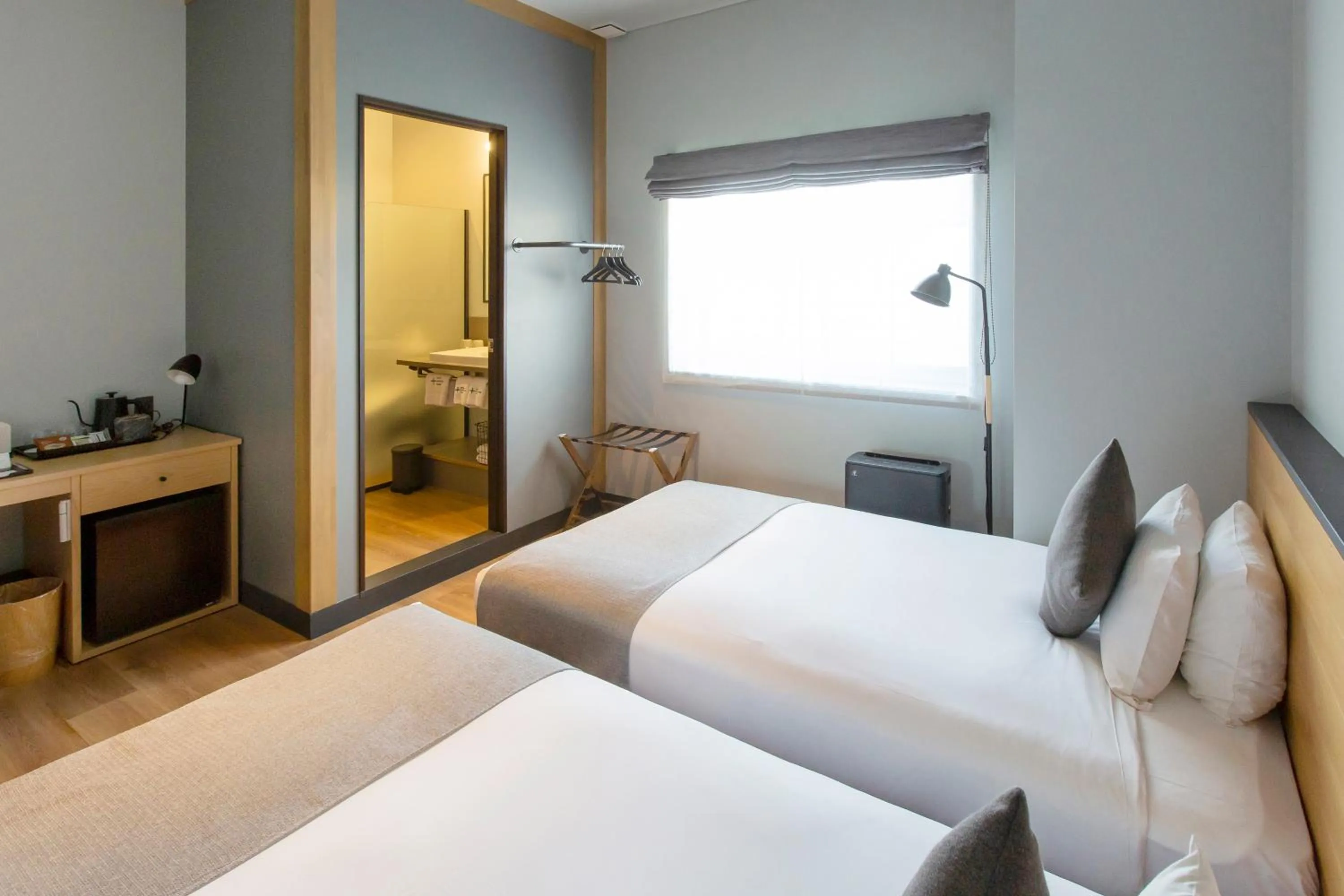 Bed in HOTEL KARUIZAWA CROSS