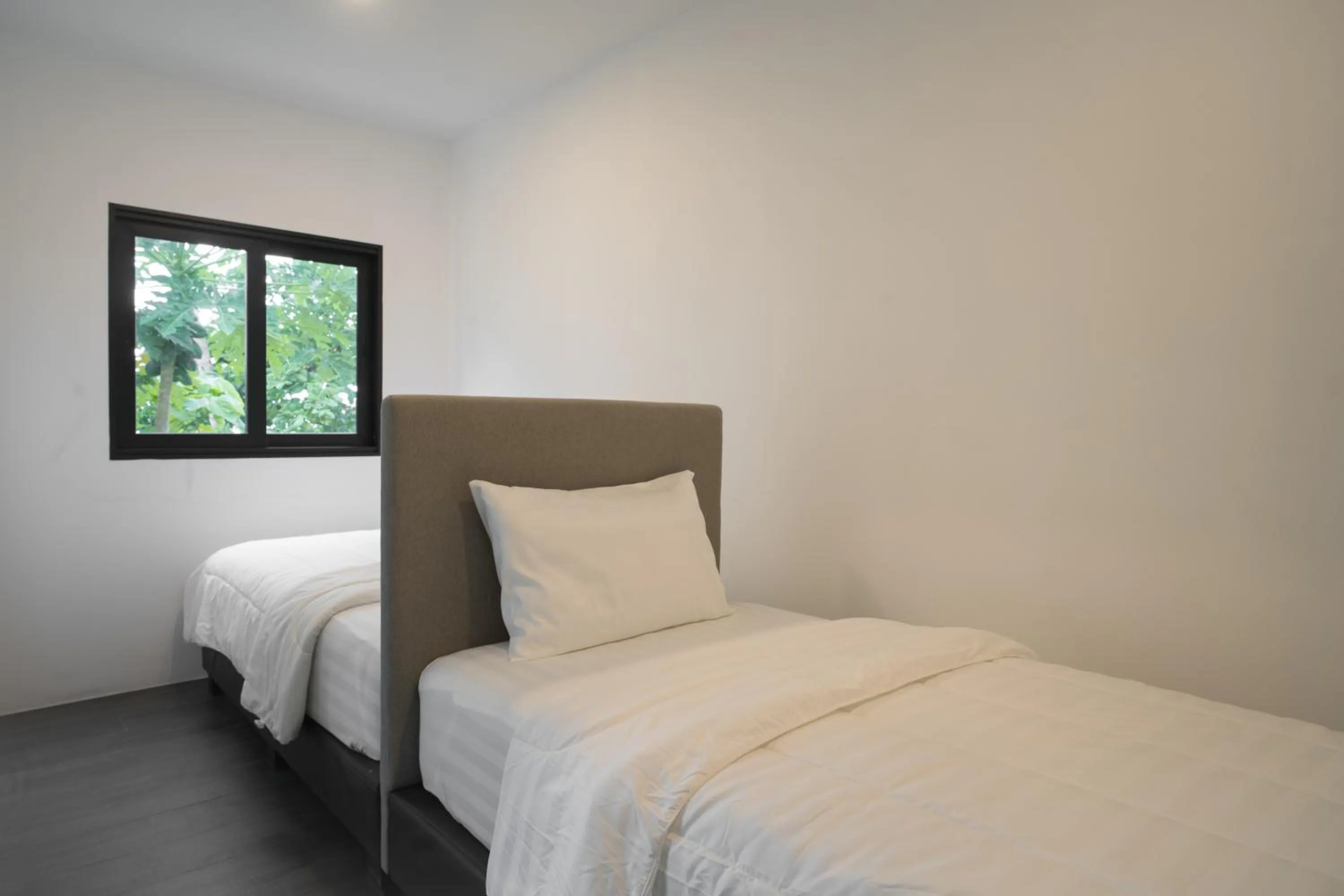 Bed in Pine Bungalow Krabi