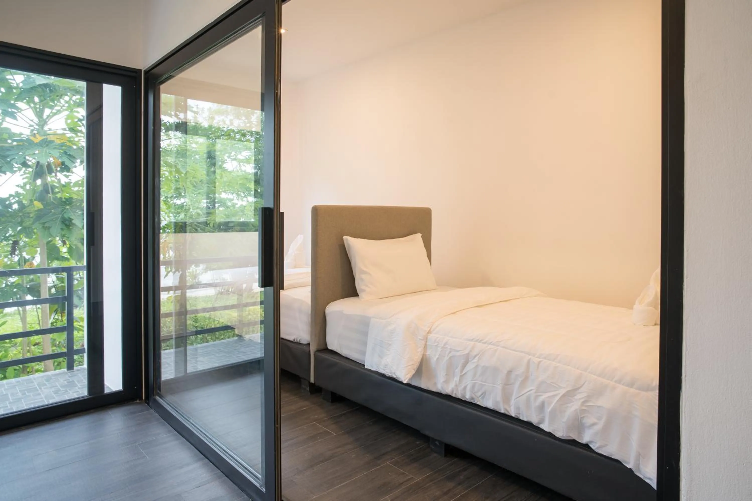 Bed in Pine Bungalow Krabi