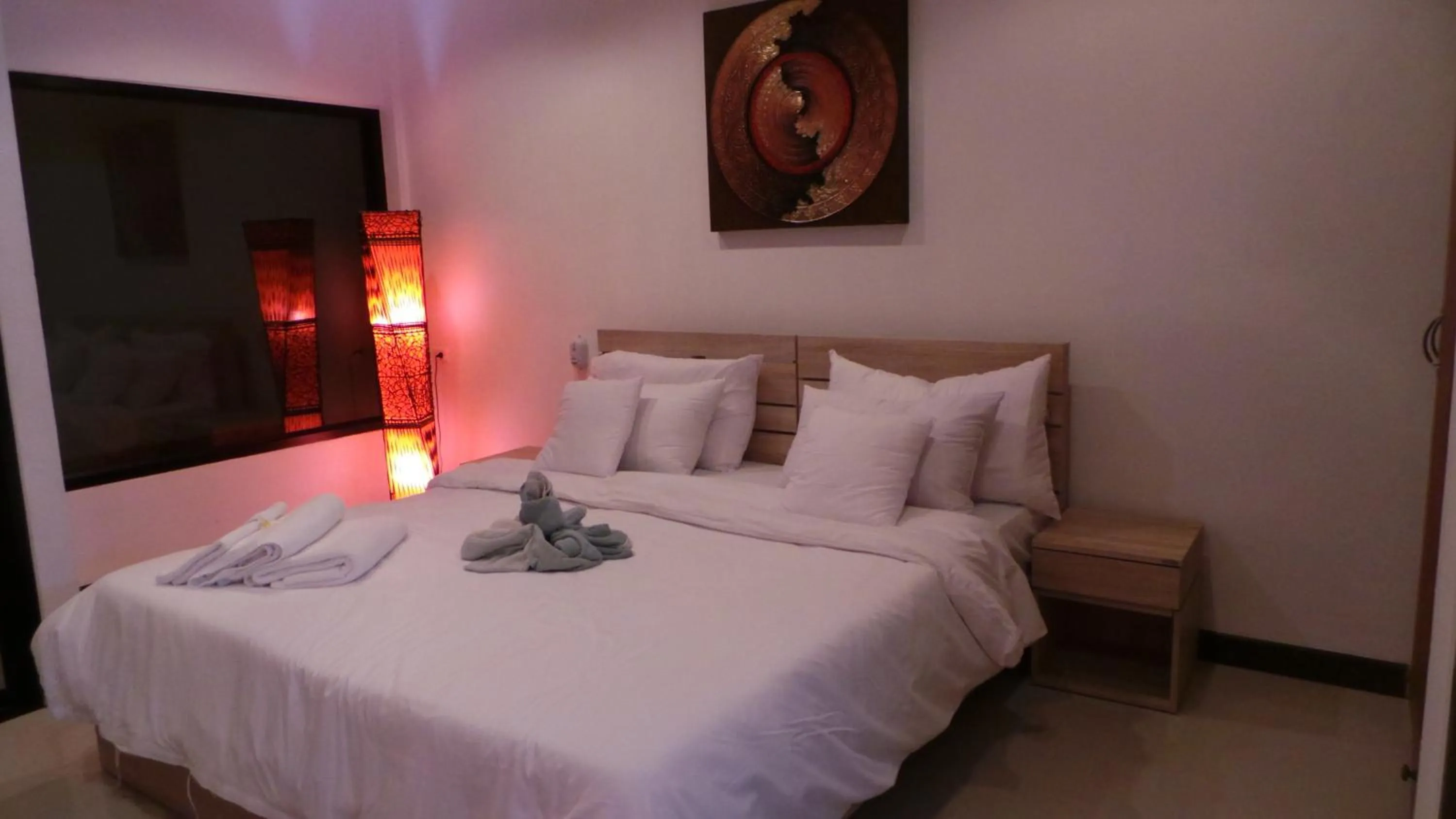 Bed in The Reef Resort