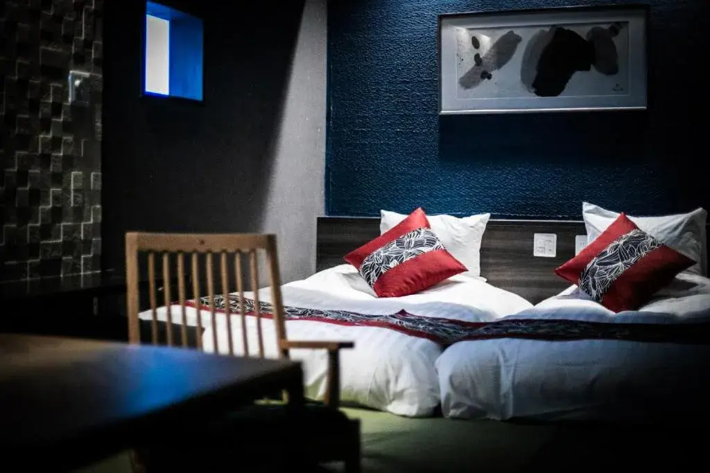 Bed in Tsukasa Ryokan Bed in Tsukasa Ryokan