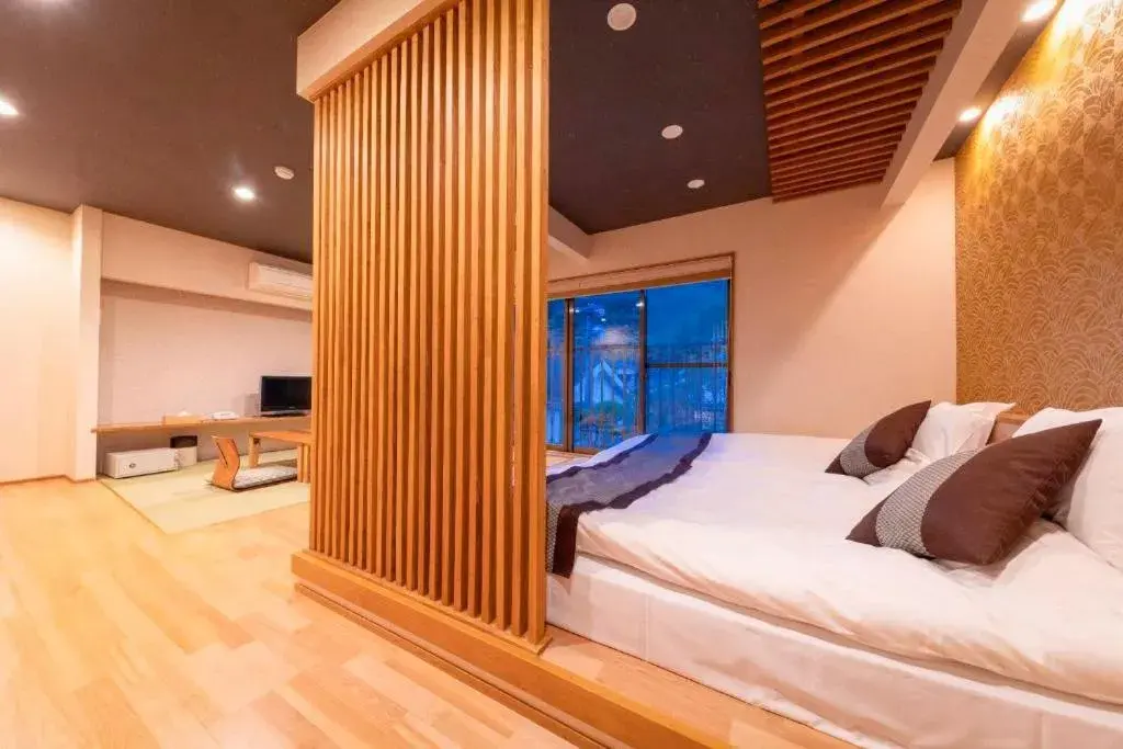 Bed in Tsukasa Ryokan Bed in Tsukasa Ryokan