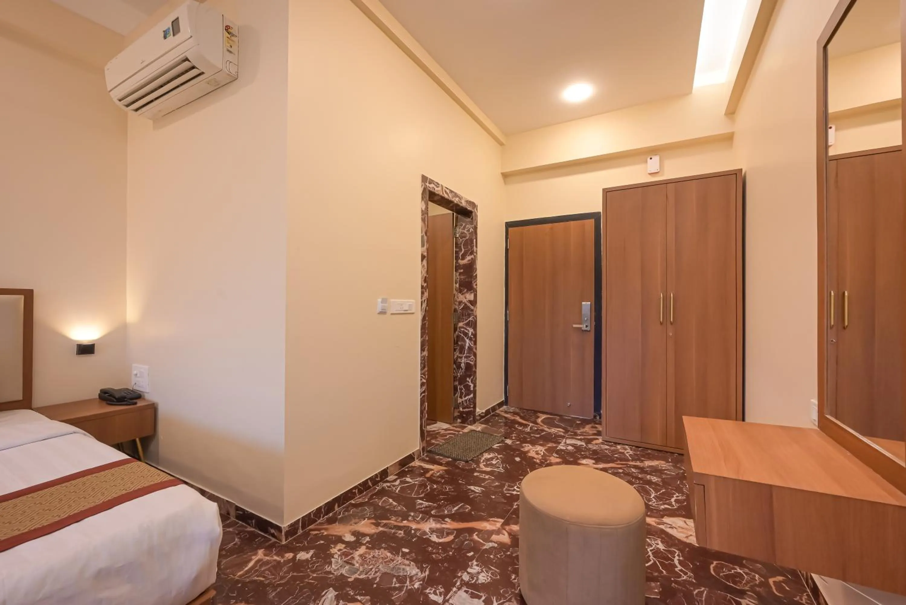 wardrobe, Bed in Hotel Aristro Lonavala