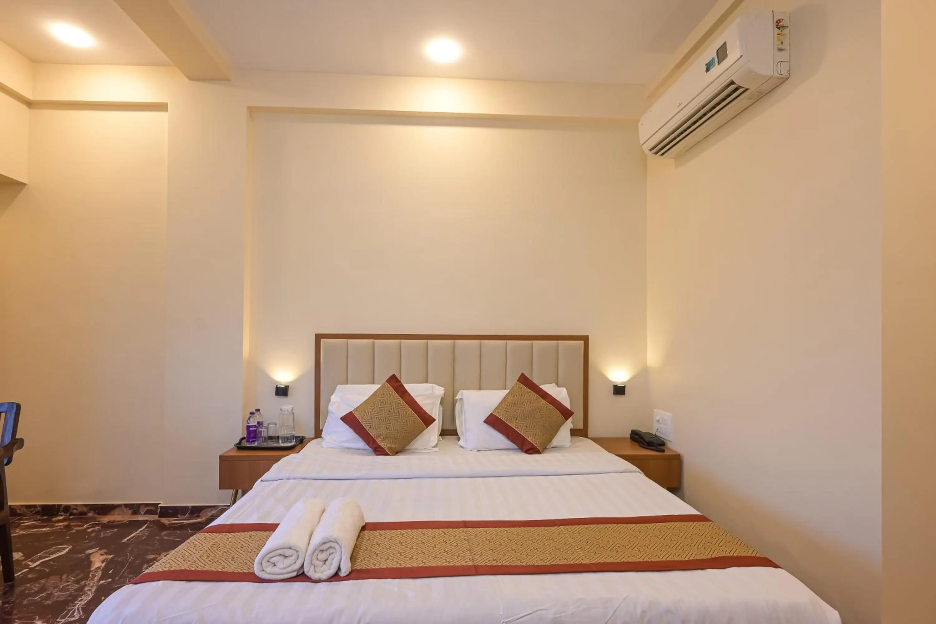 Bed in Hotel Aristro Lonavala