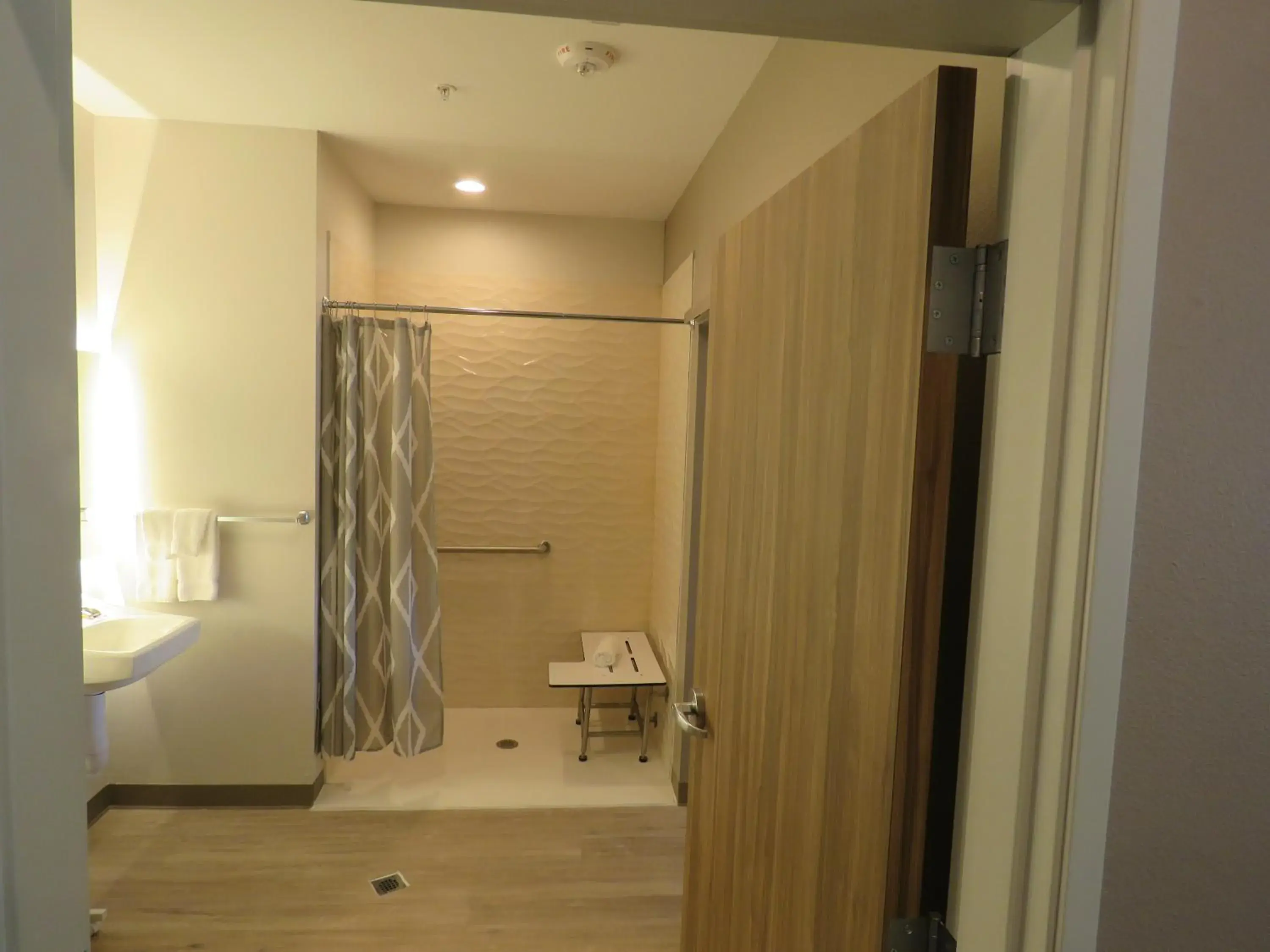 1 King Bed, Mobility Accessible Room, 1BR Suite, Roll in shower, Non-Smoking in Wyndham Garden College Station 1 King Bed, Mobility Accessible Room, 1BR Suite, Roll in shower, Non-Smoking in Wyndham Garden College Station