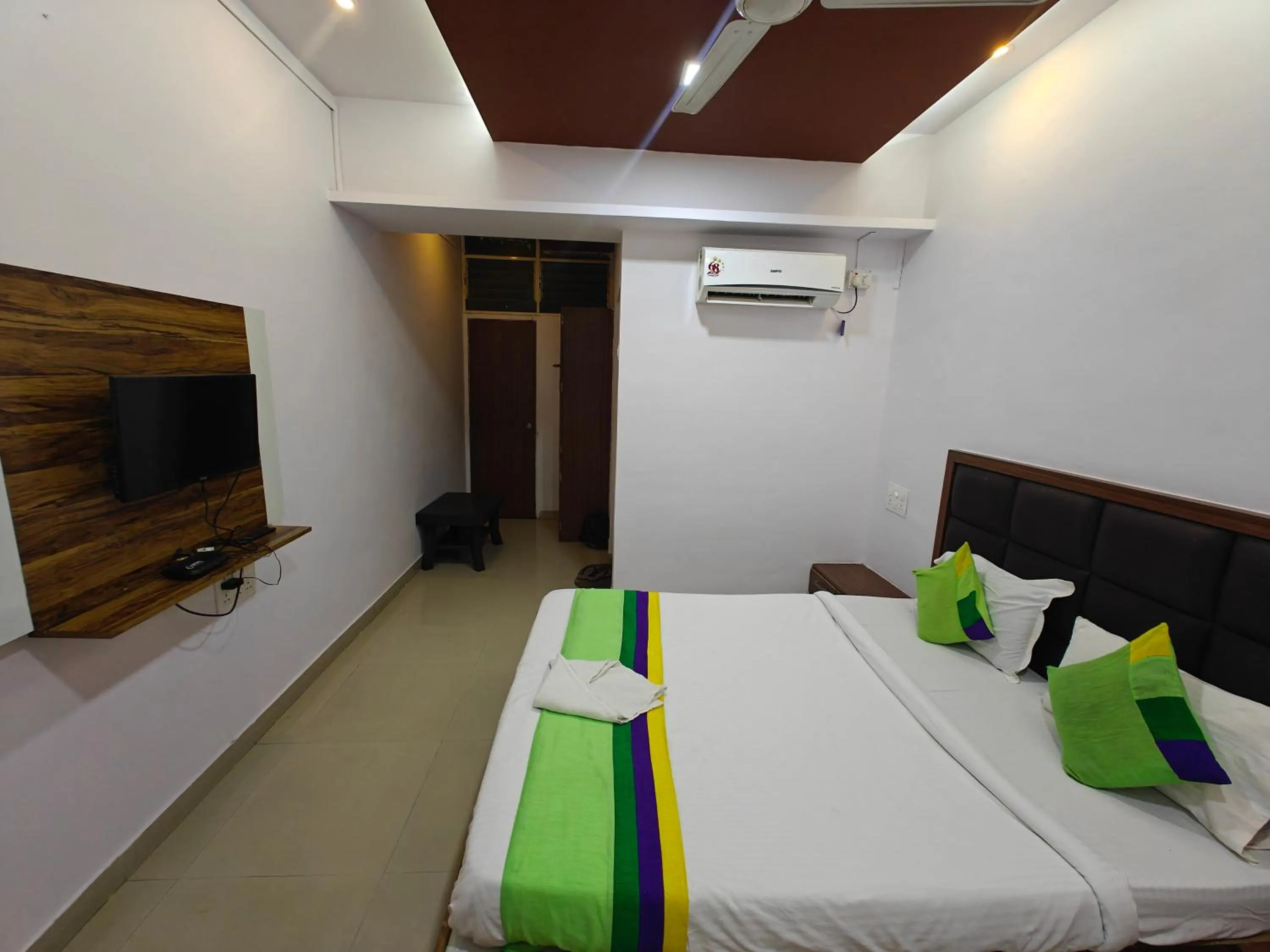 Bed in Sai Samrat Resort