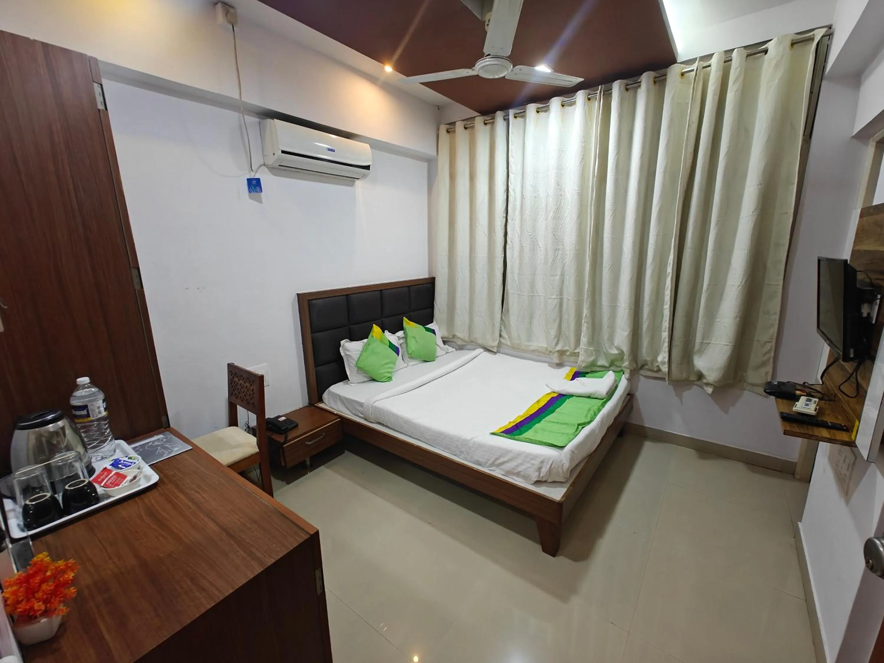 Bed in Sai Samrat Resort