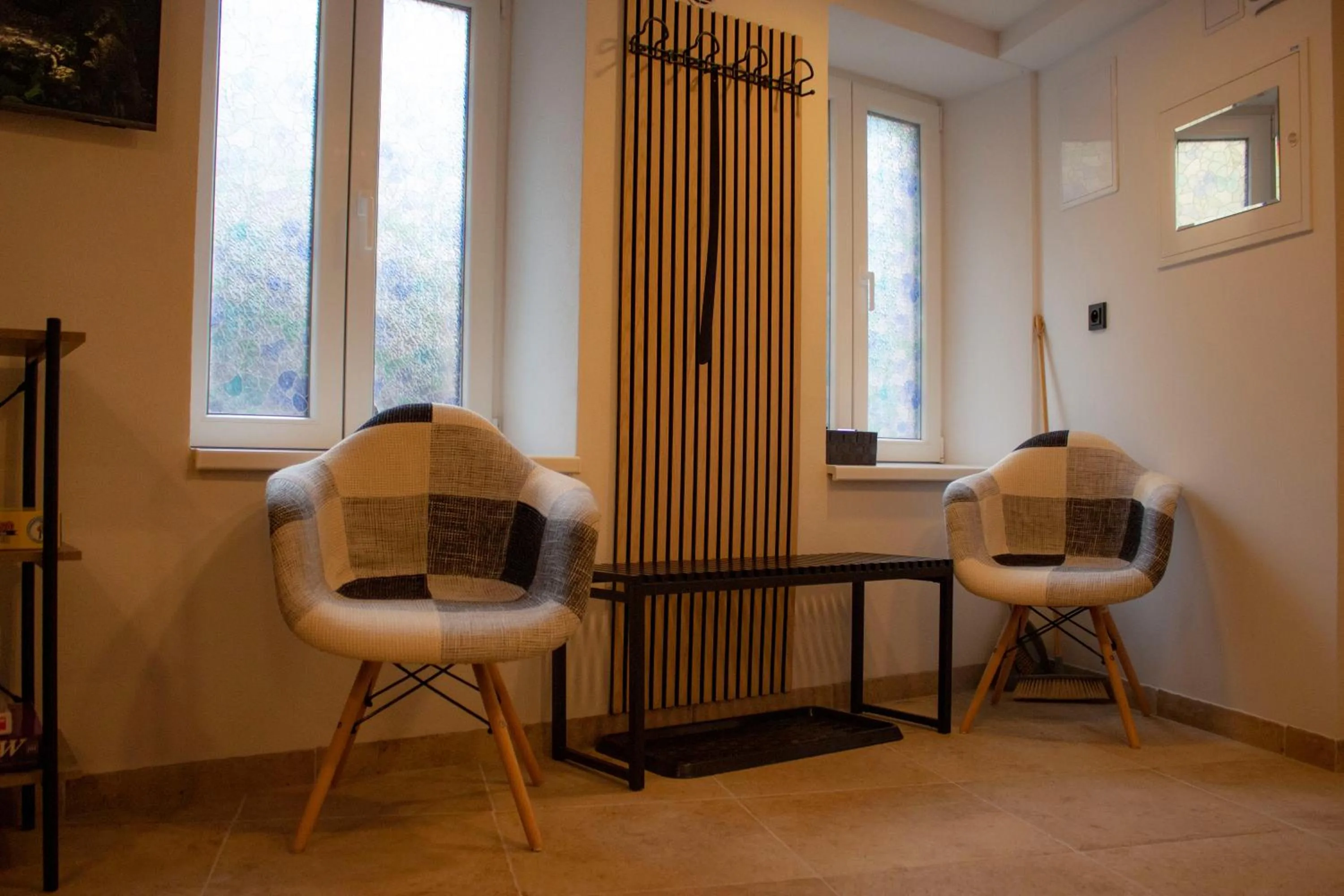 Communal lounge/ TV room in Apartmány v podhradí