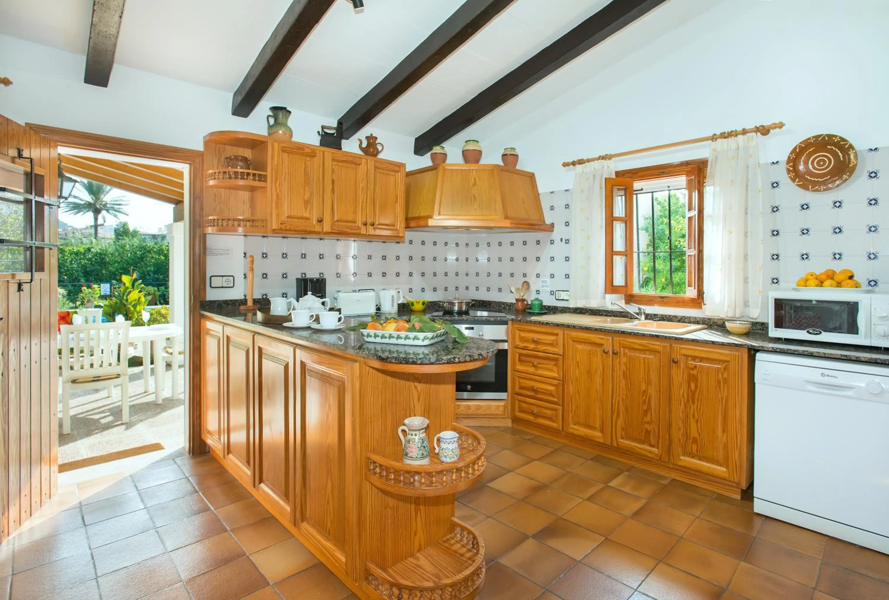 Kitchen or kitchenette in Owl Booking Villa Mateu - 5 Min Walk to the Old Town
