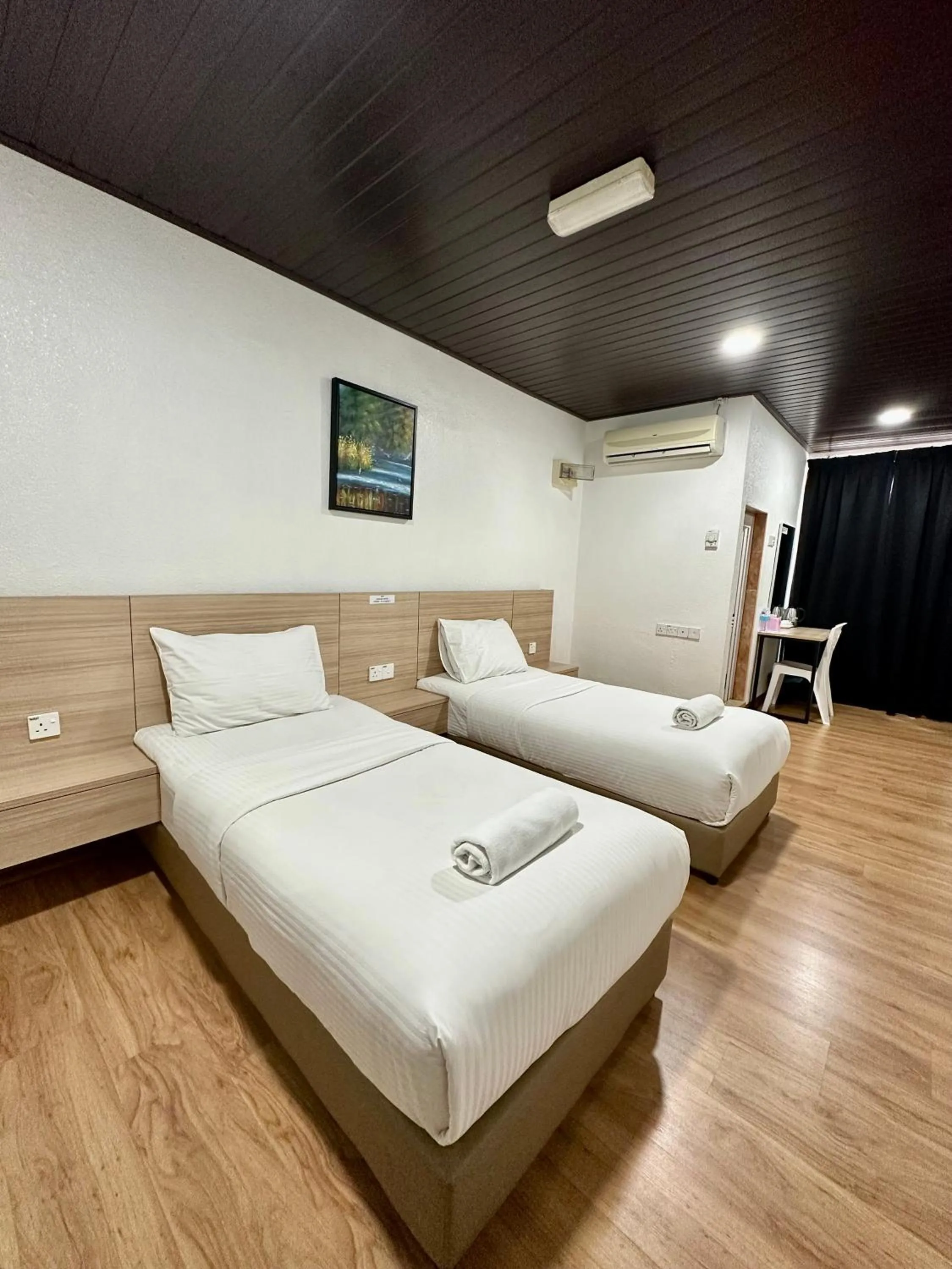 Bed in Kangar Hotel Sdn Bhd