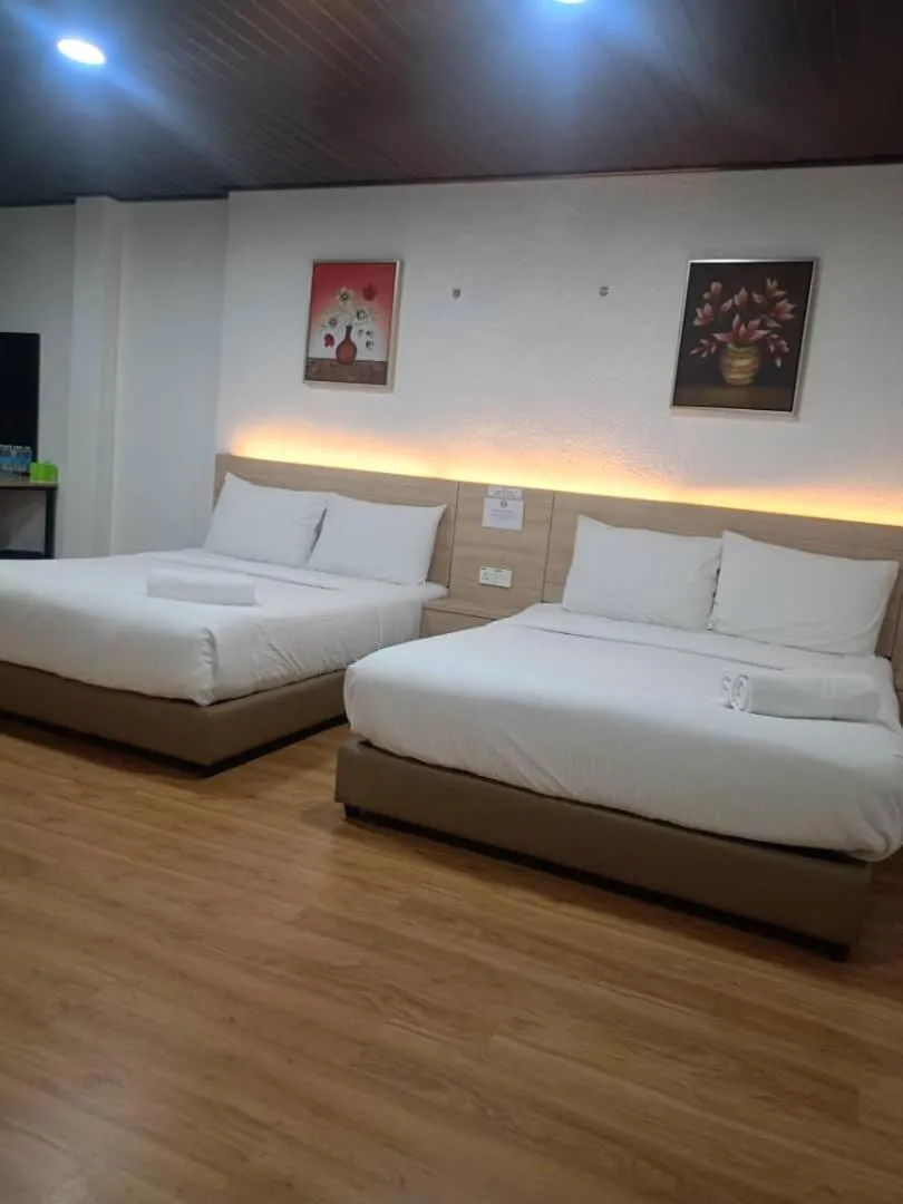 Bed in Kangar Hotel Sdn Bhd