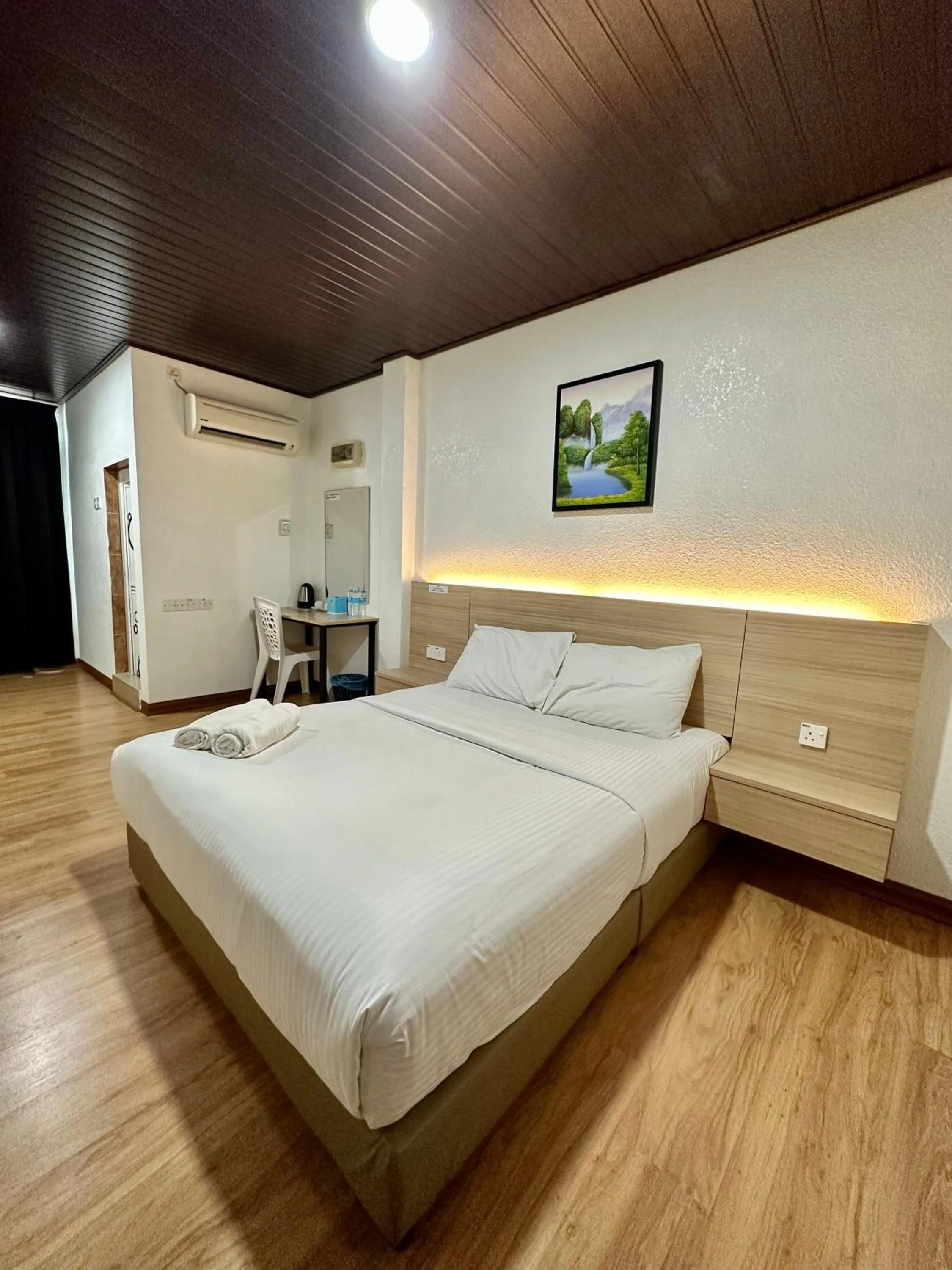 Bed in Kangar Hotel Sdn Bhd