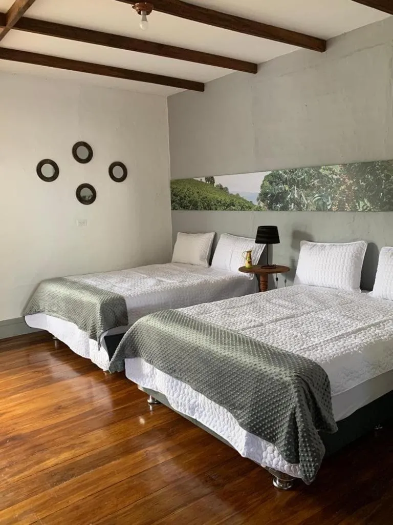 Bed in La Estancia Hotel Boutique