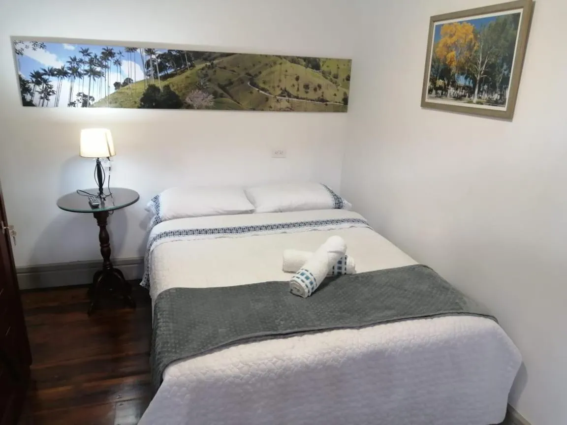 Bed in La Estancia Hotel Boutique