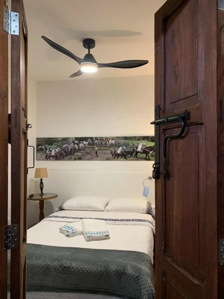 Bed in La Estancia Hotel Boutique