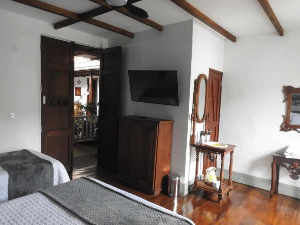 Bed in La Estancia Hotel Boutique